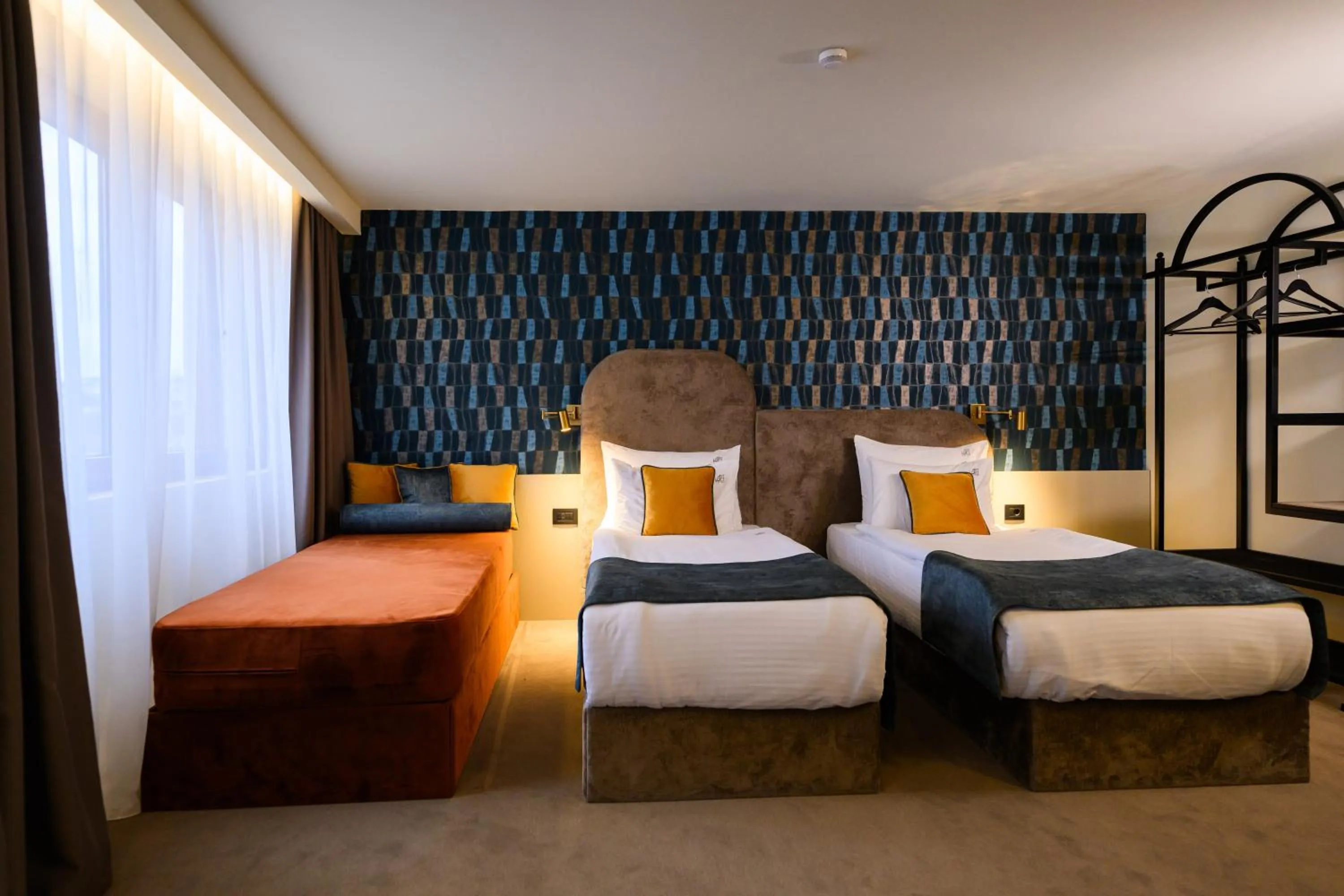 Bed in ArtLoft Garni Hotel