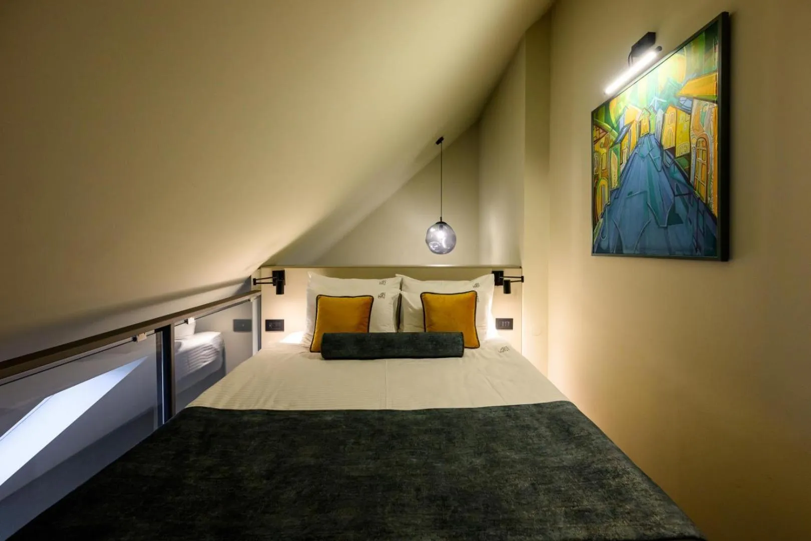 Bed in ArtLoft Garni Hotel