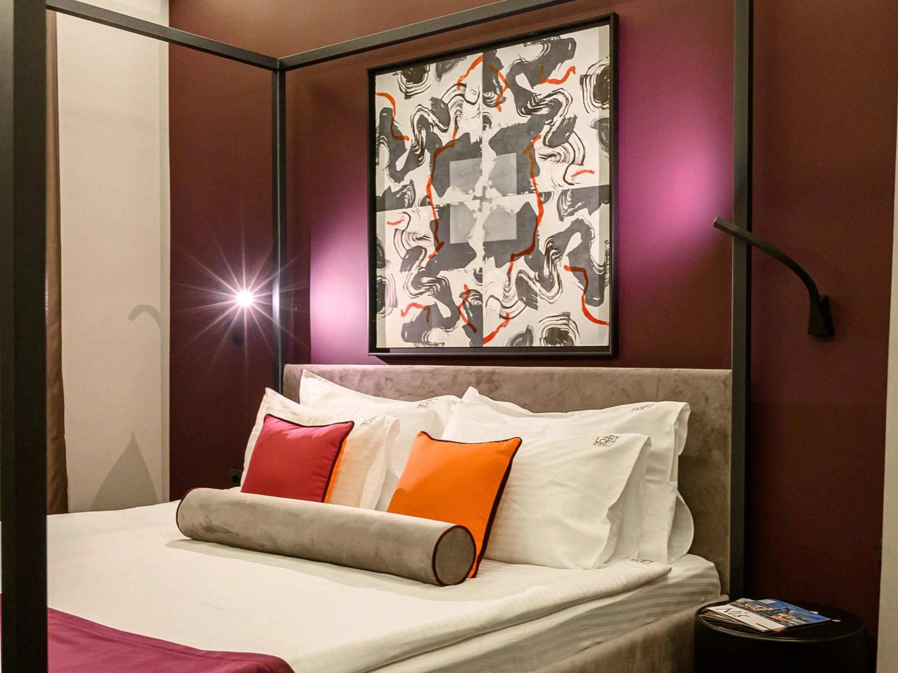 Bed in ArtLoft Garni Hotel