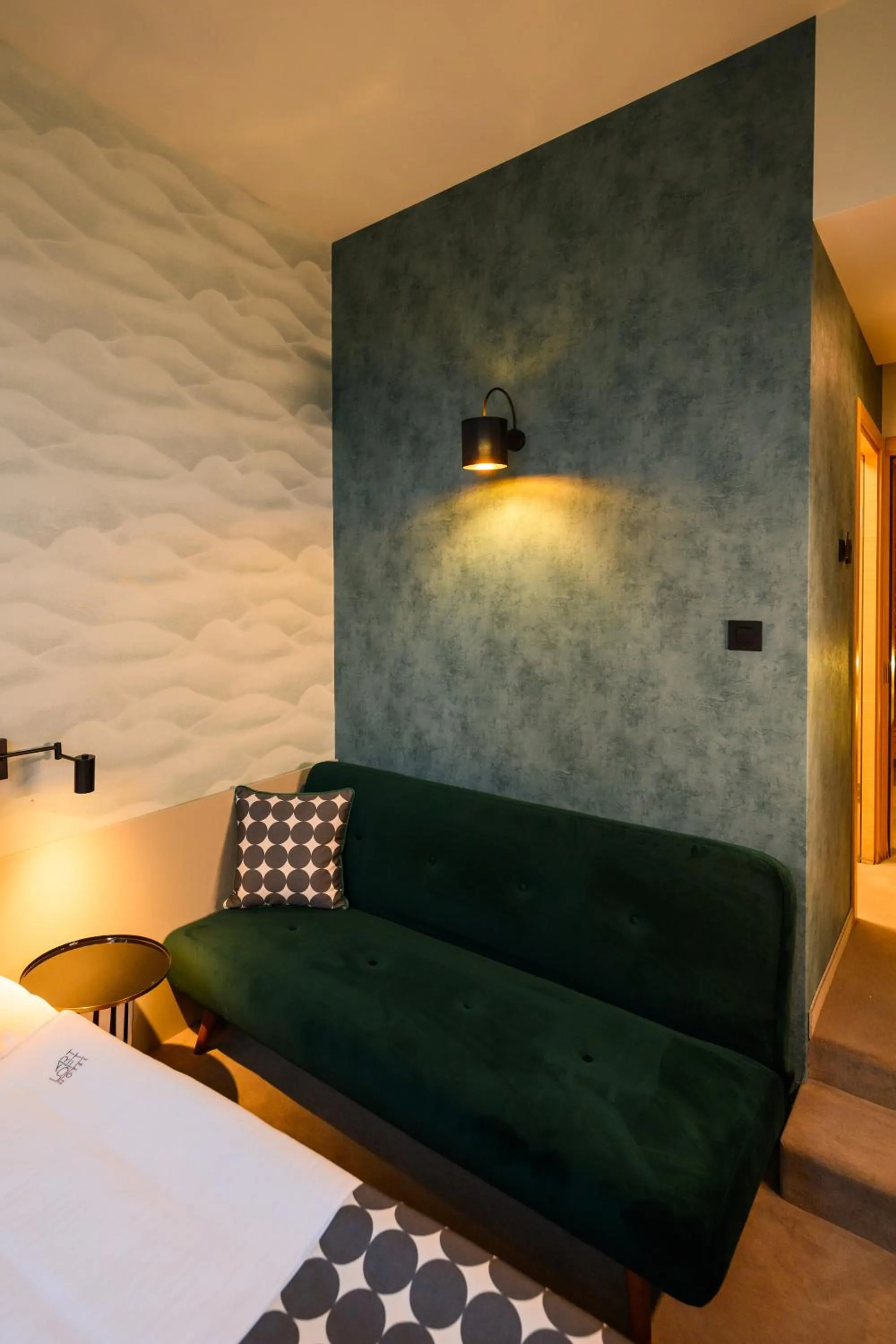 Bed in ArtLoft Garni Hotel