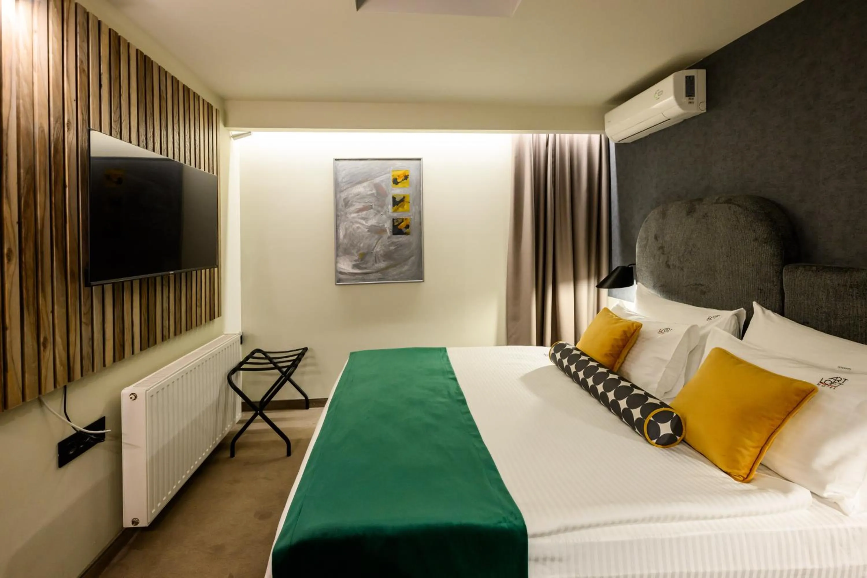 Photo of the whole room, Bed in ArtLoft Garni Hotel