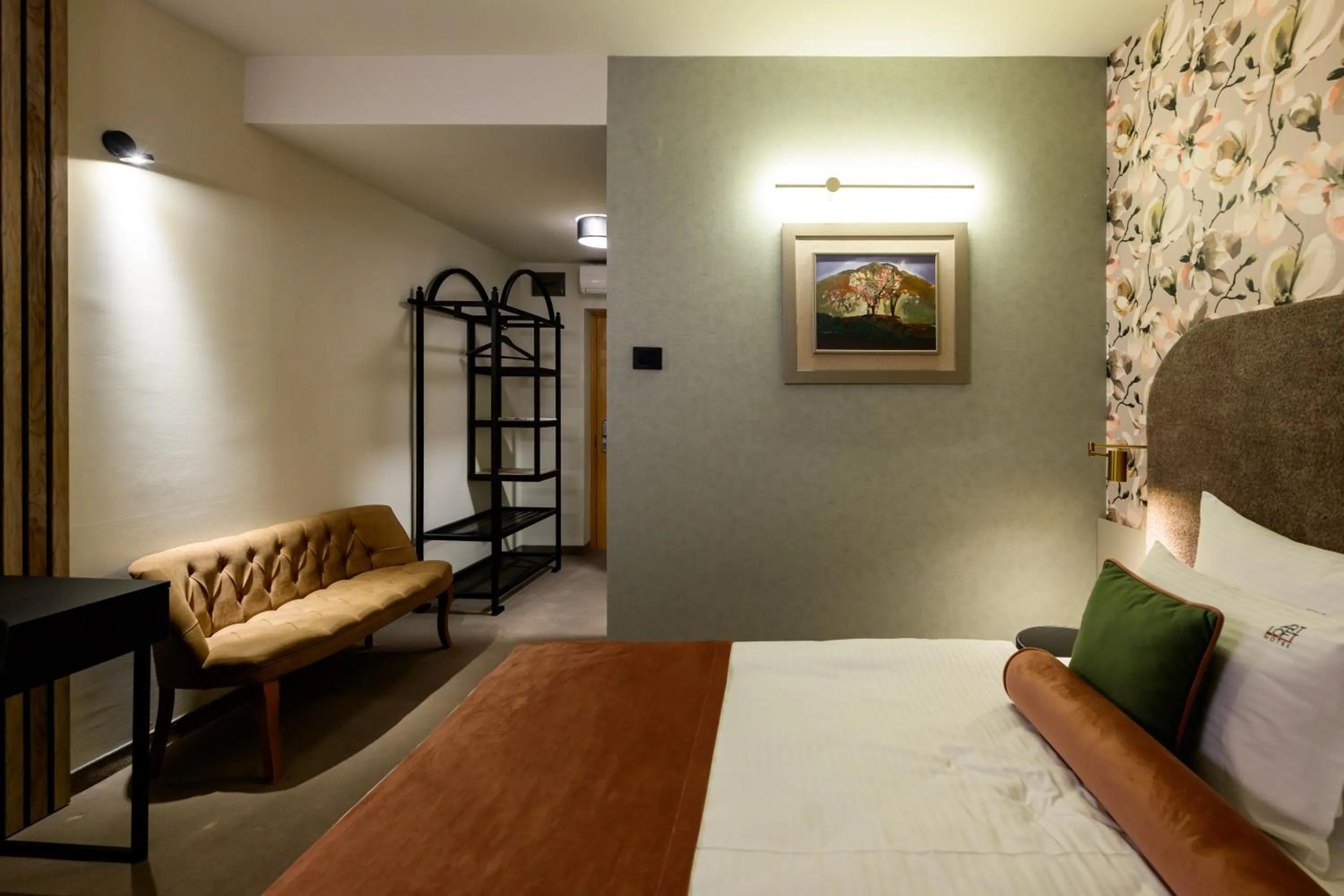 Bed in ArtLoft Garni Hotel