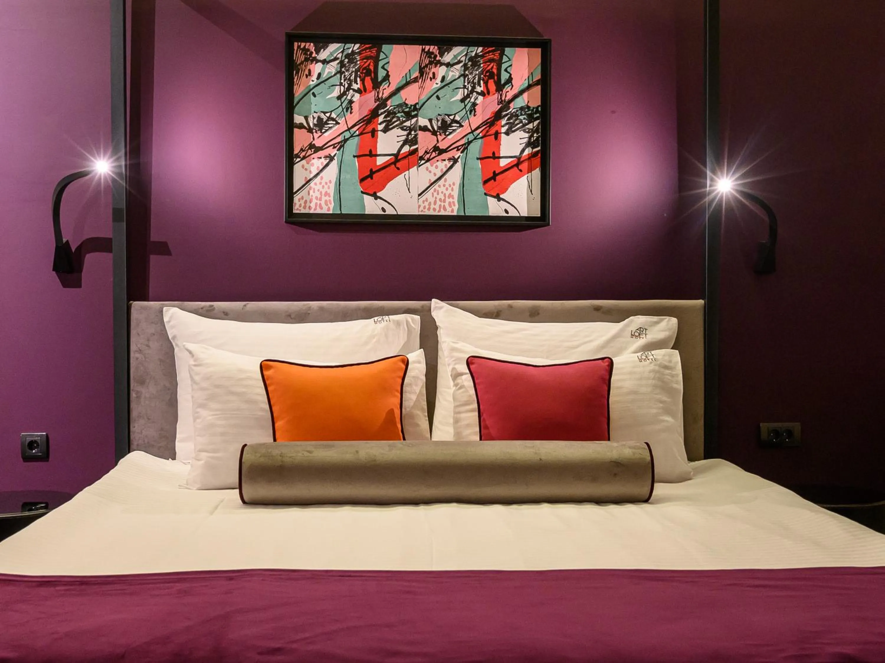 Bed in ArtLoft Garni Hotel