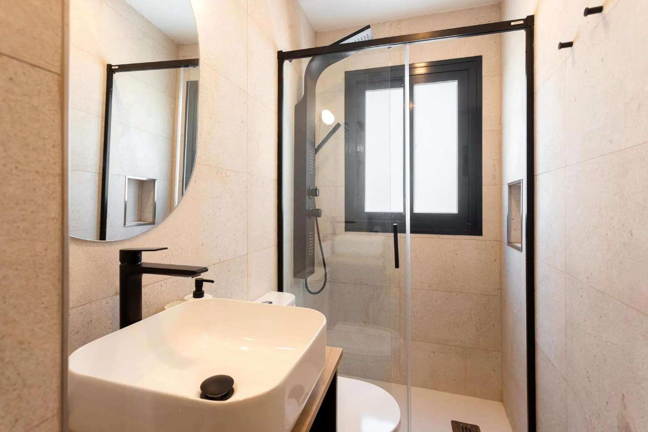 Shower in ARENAL SUITES BENIDORM
