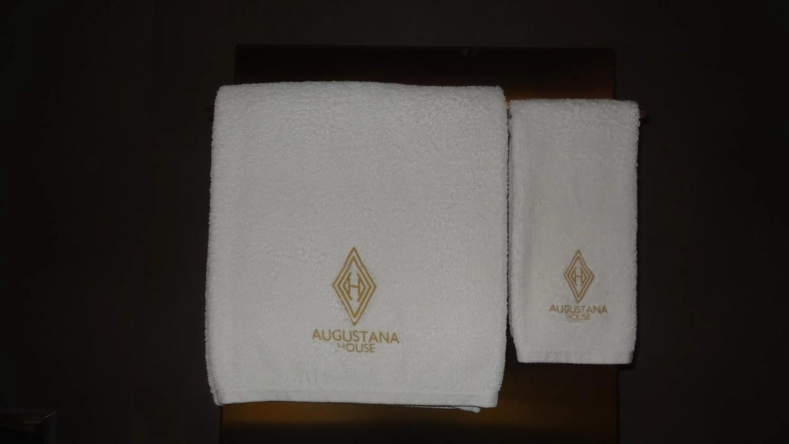 Logo/Certificate/Sign in Augustana House and Suites