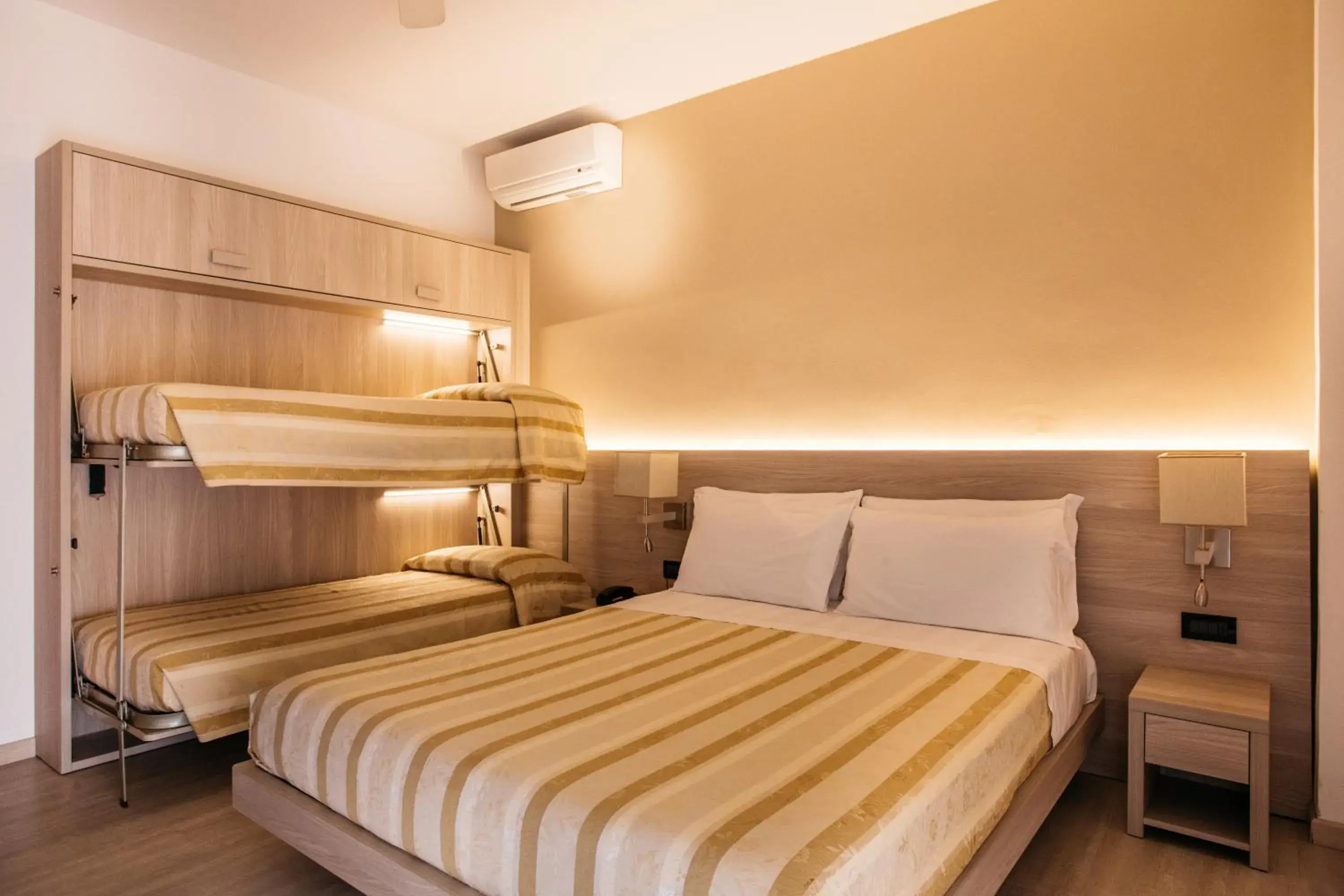 Quadruple Room with Balcony in Hotel Angelo Quadruple Room with Balcony in Hotel Angelo