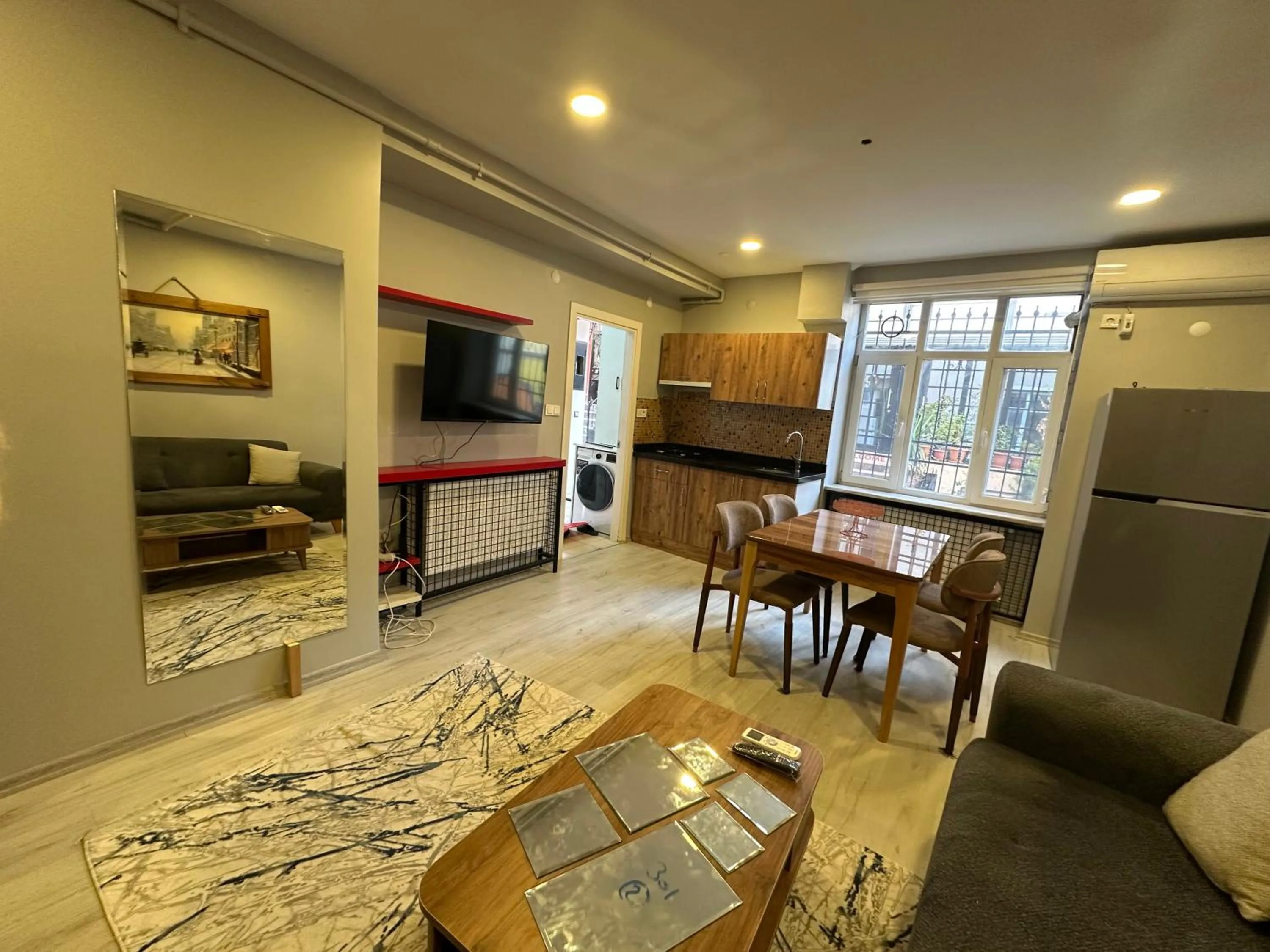 Communal lounge/ TV room in Taksim Story Residence