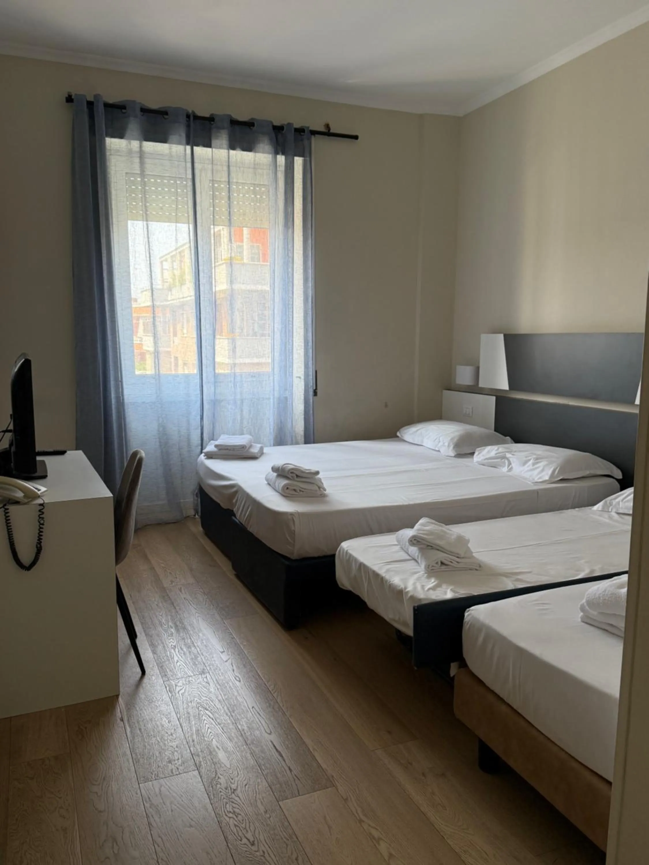 Property building, Bed in Hotel Laura