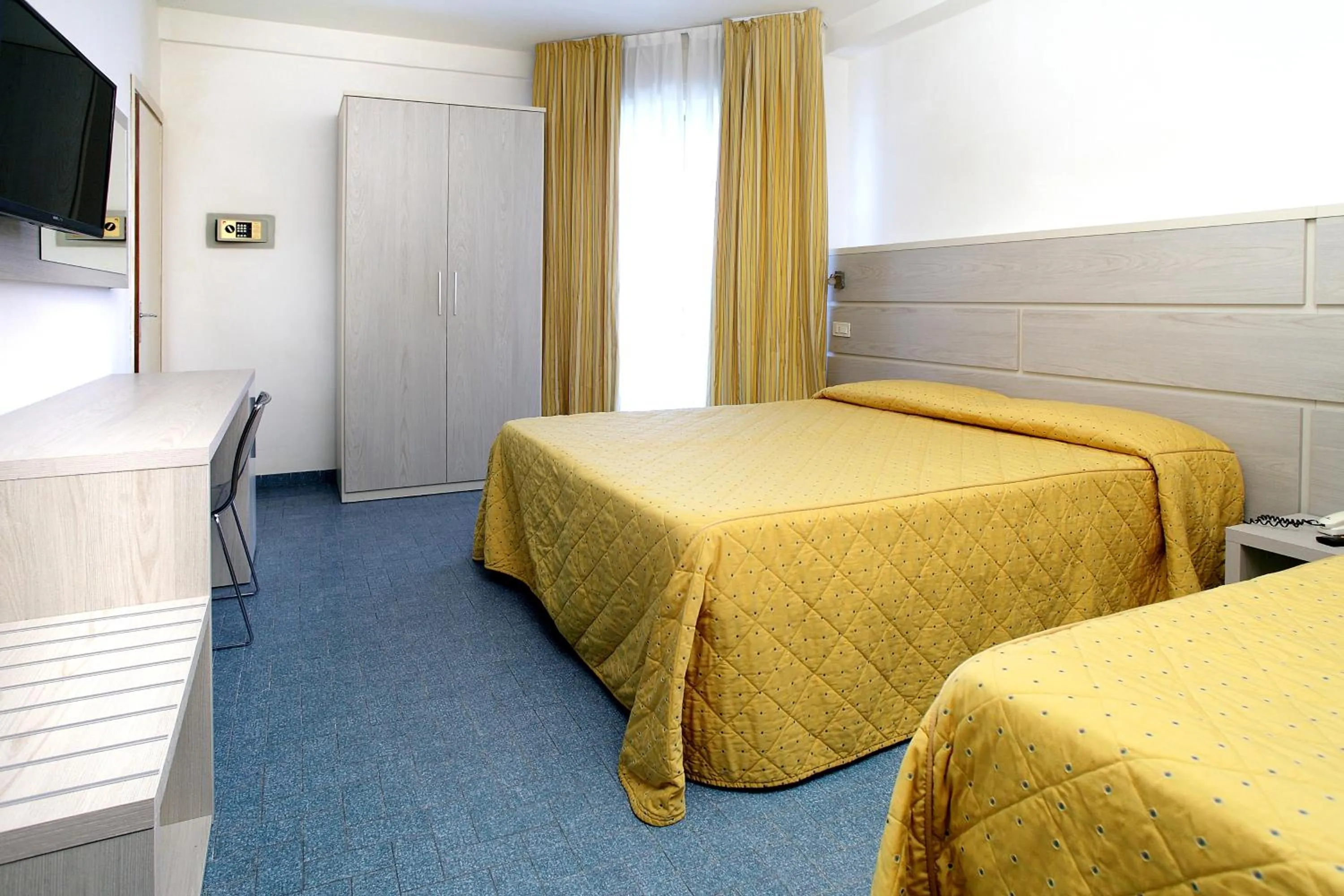 Bed in Arianna Hotel