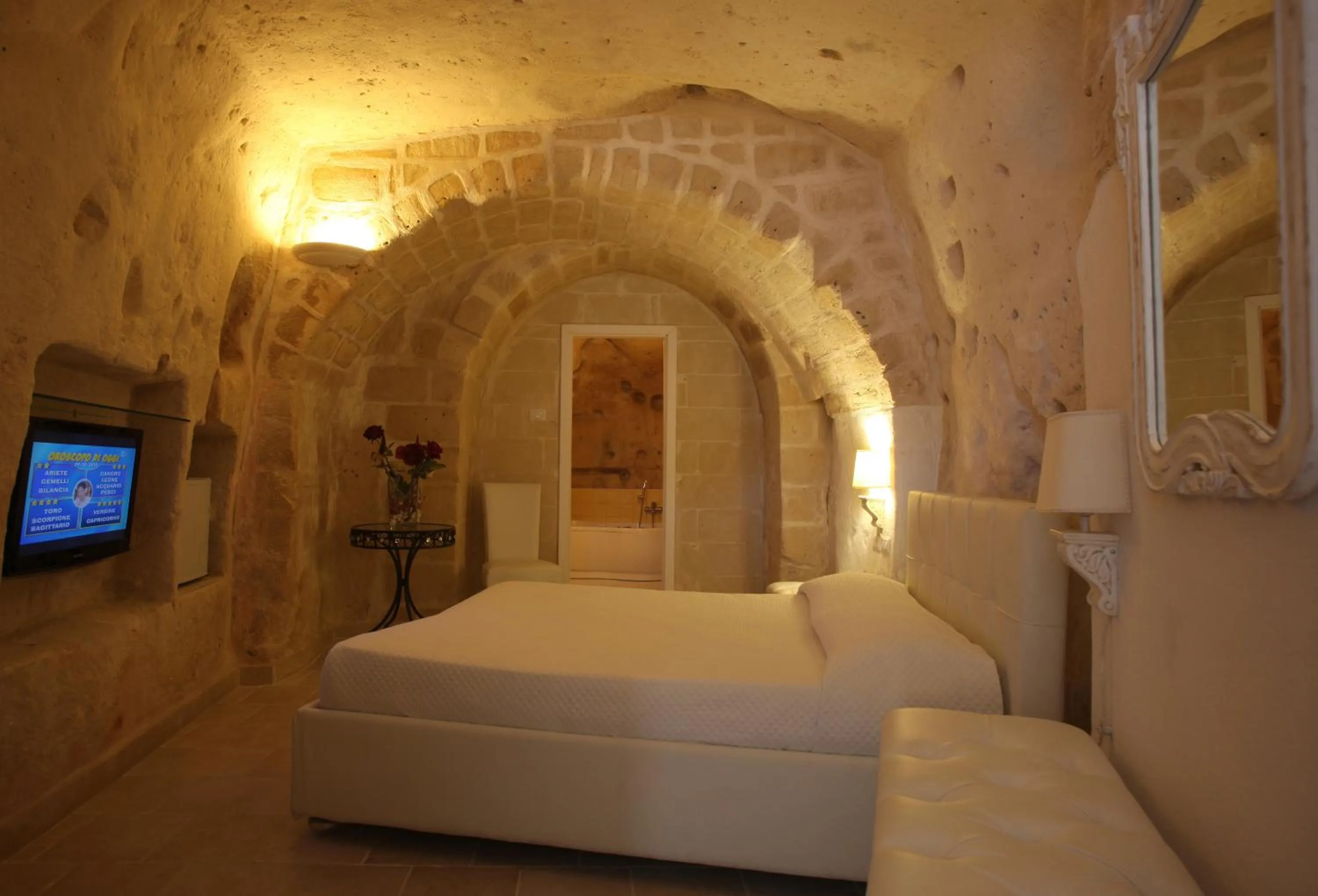 Bed in Caveoso Hotel
