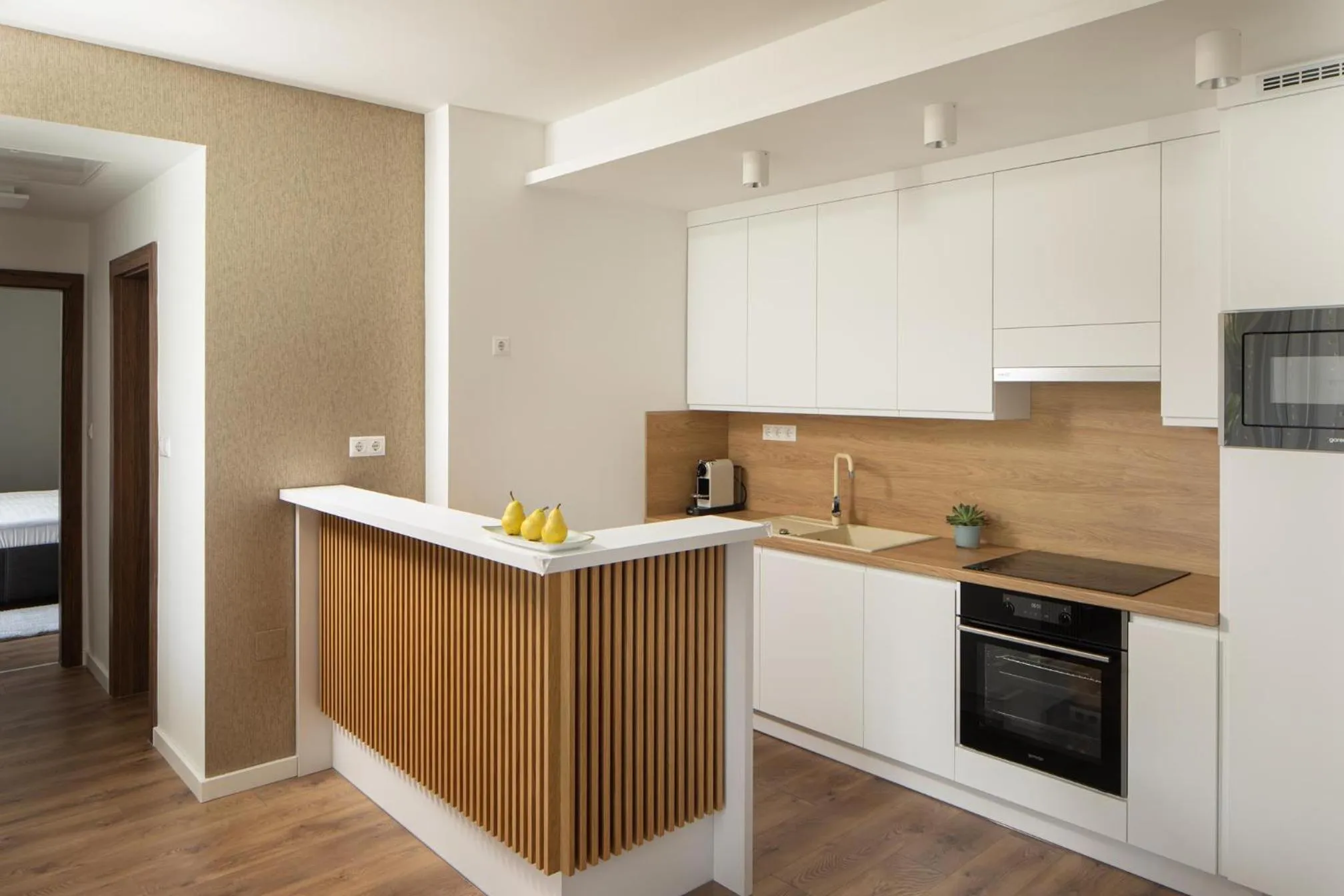 Kitchen or kitchenette in Spa Residence Carbona Onyx Deluxe Apartman