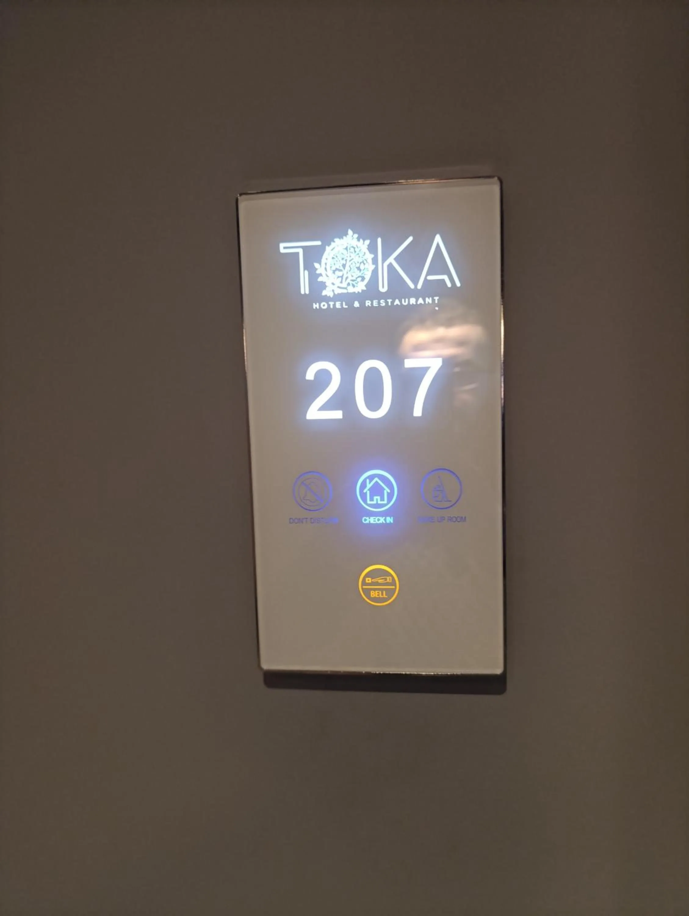 Property logo or sign in Toka Hotel Restaurant