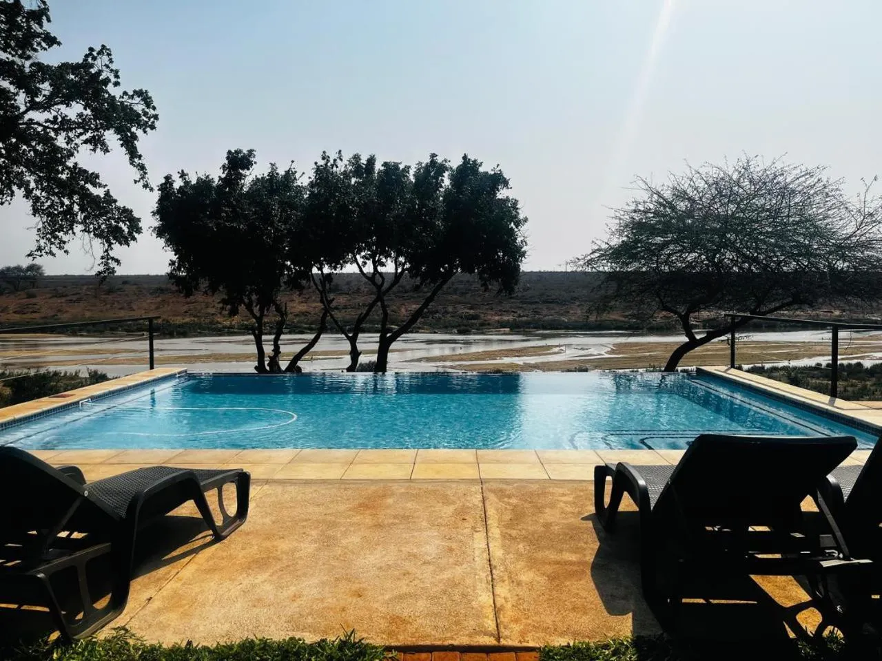 Pool view in Crocodile Bridge Safari Lodge