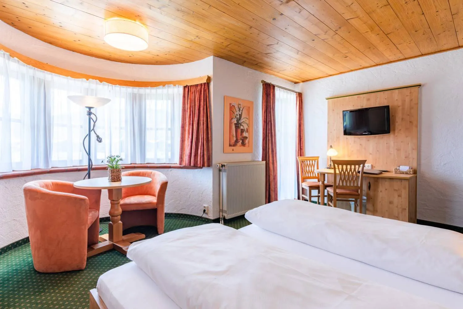 Bed in Das Maximilian - Feines Landhotel am Schliersee