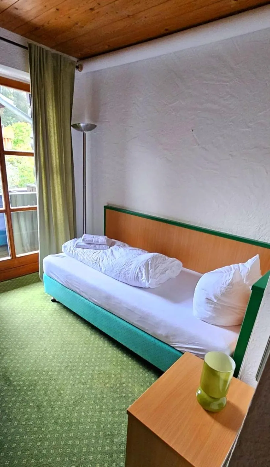 Bed in Das Maximilian - Feines Landhotel am Schliersee