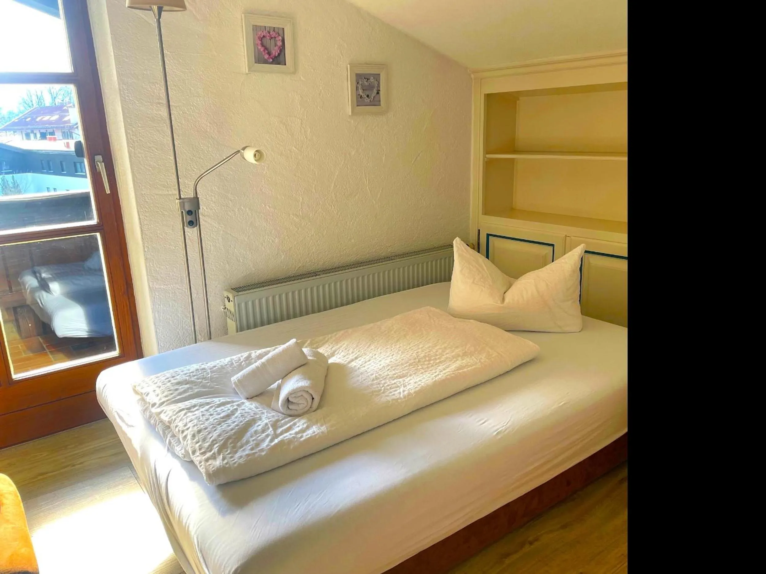 Bed in Das Maximilian - Feines Landhotel am Schliersee