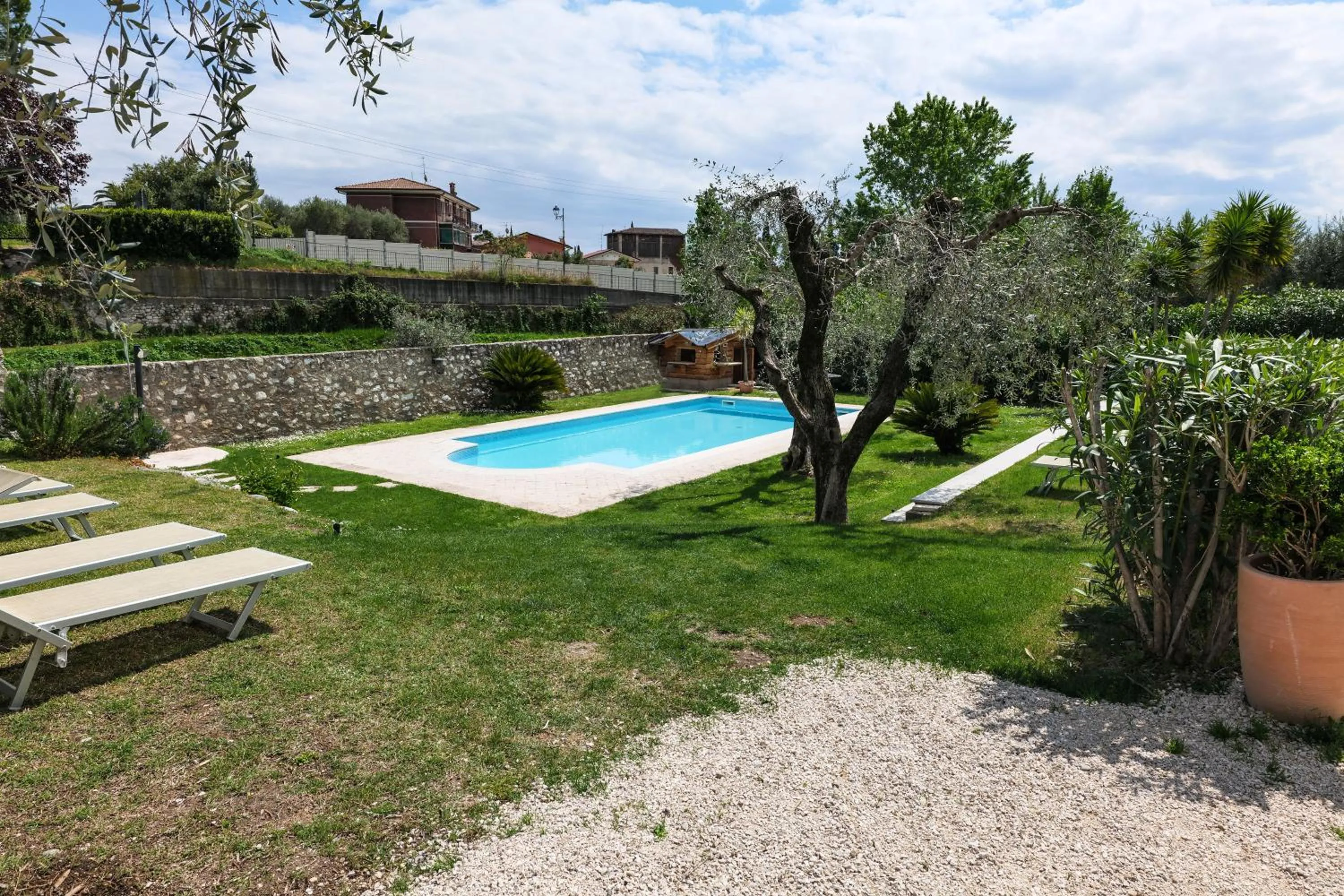 Garden in Borgo degli Ulivi Residence di Olympic Garda Lake