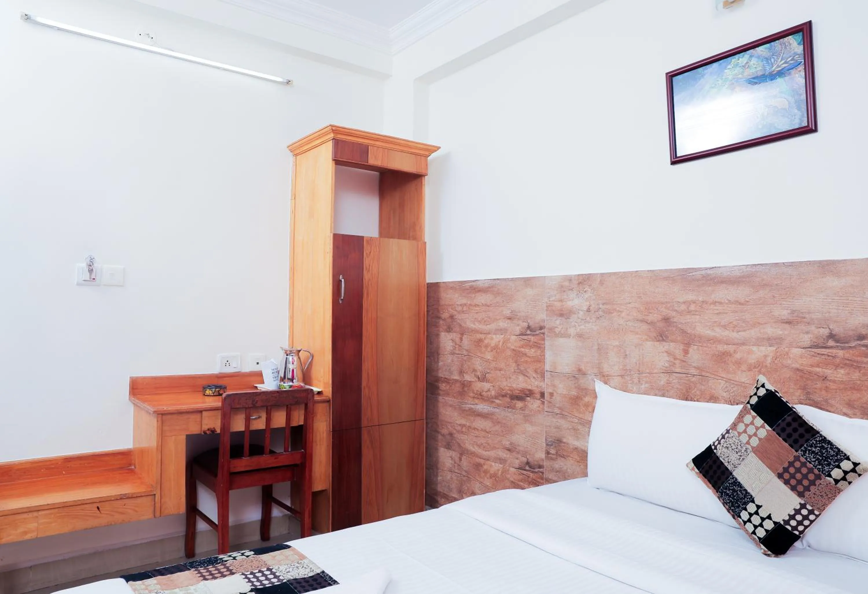 Photo of the whole room, Bed in A V Residency