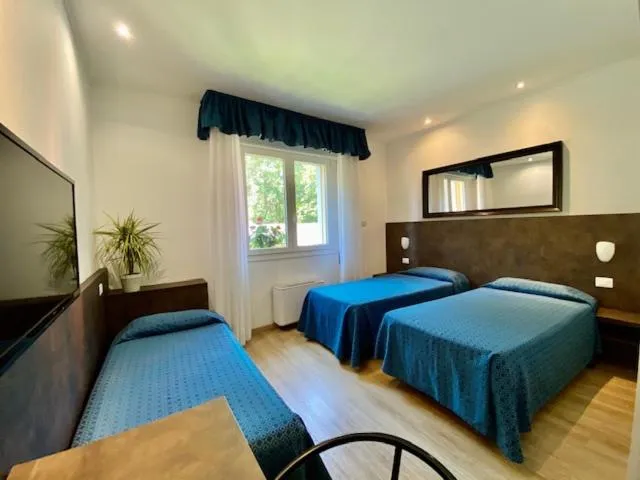 Bed in Hotel Garibaldi