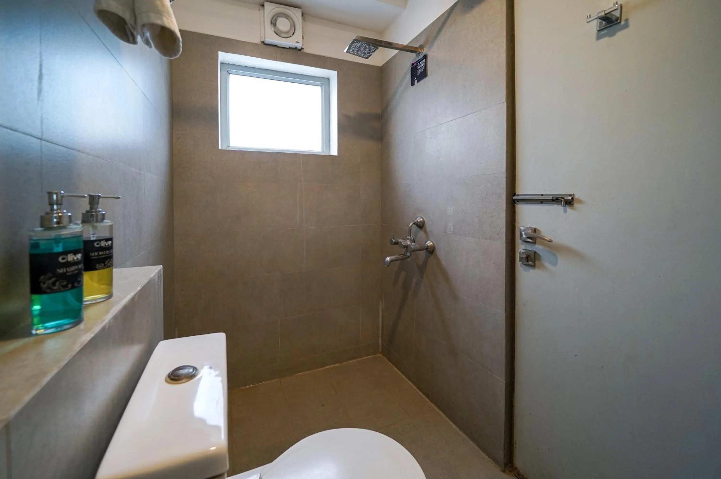 Shower in Olive Zip Koramangala 100Ft Road by Embassy Group