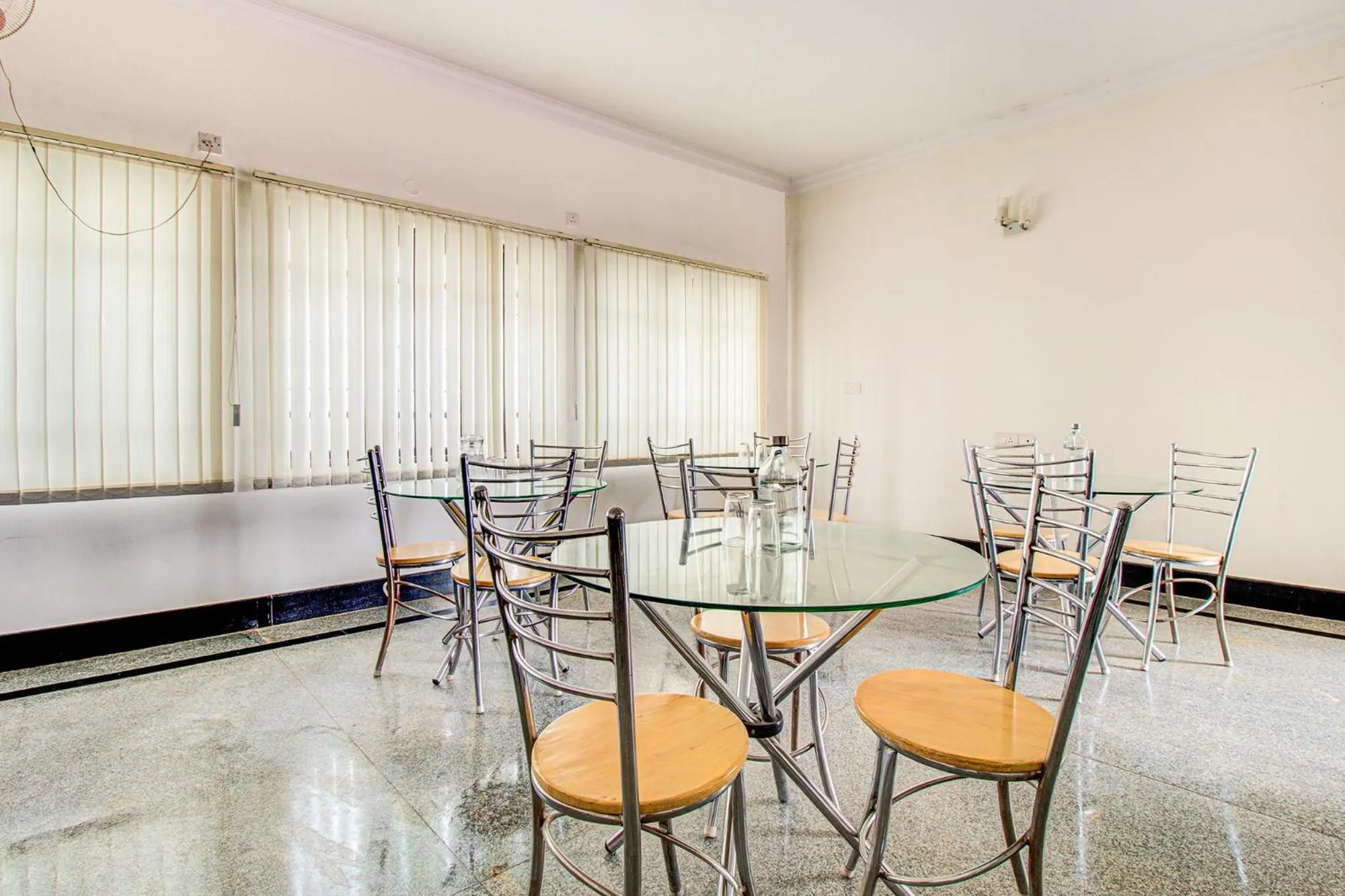 Dining area in FabHotel Emara Grand - HAL Old Airport Road