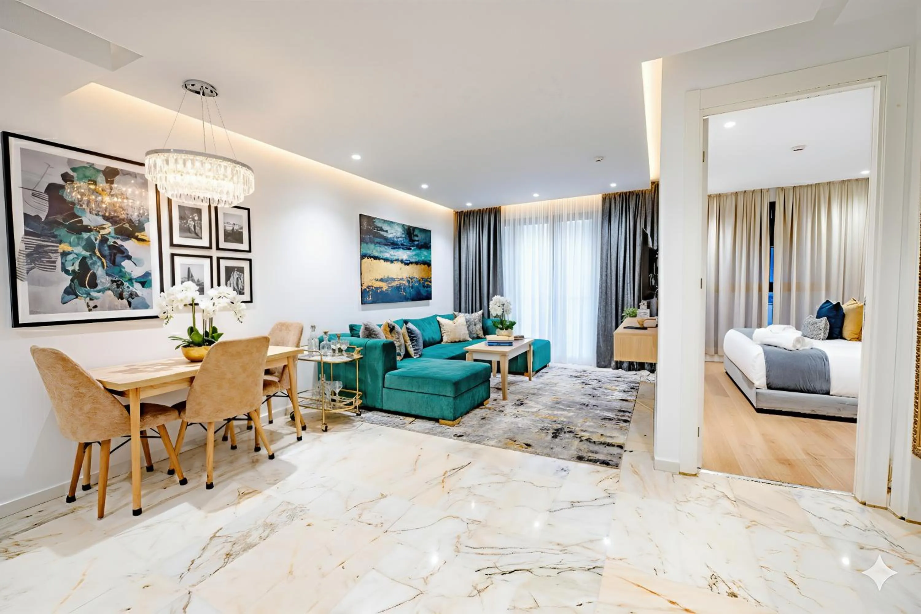 Living room, Bed in Family Aparthotel