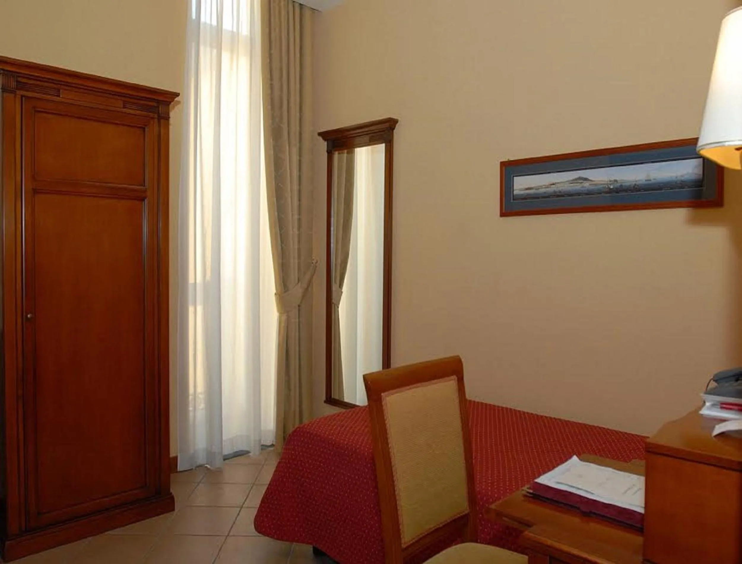 Photo of the whole room in Le Cheminée Business Hotel Napoli