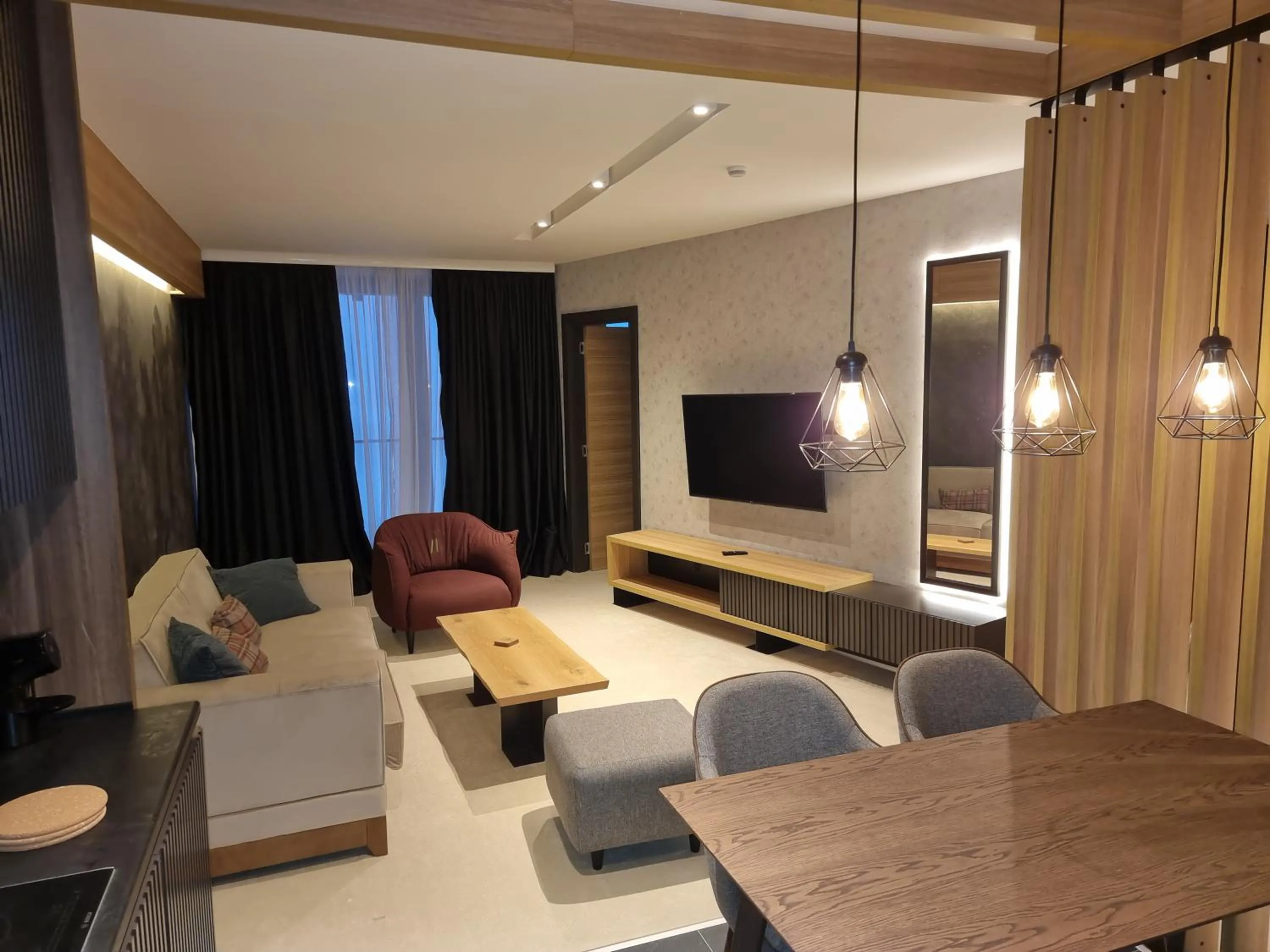 Living room in Aparthotel Woodside by Anaya