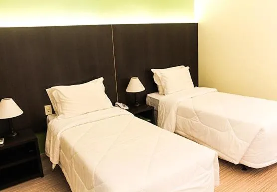 Bed in Hotel Mirante São Brás