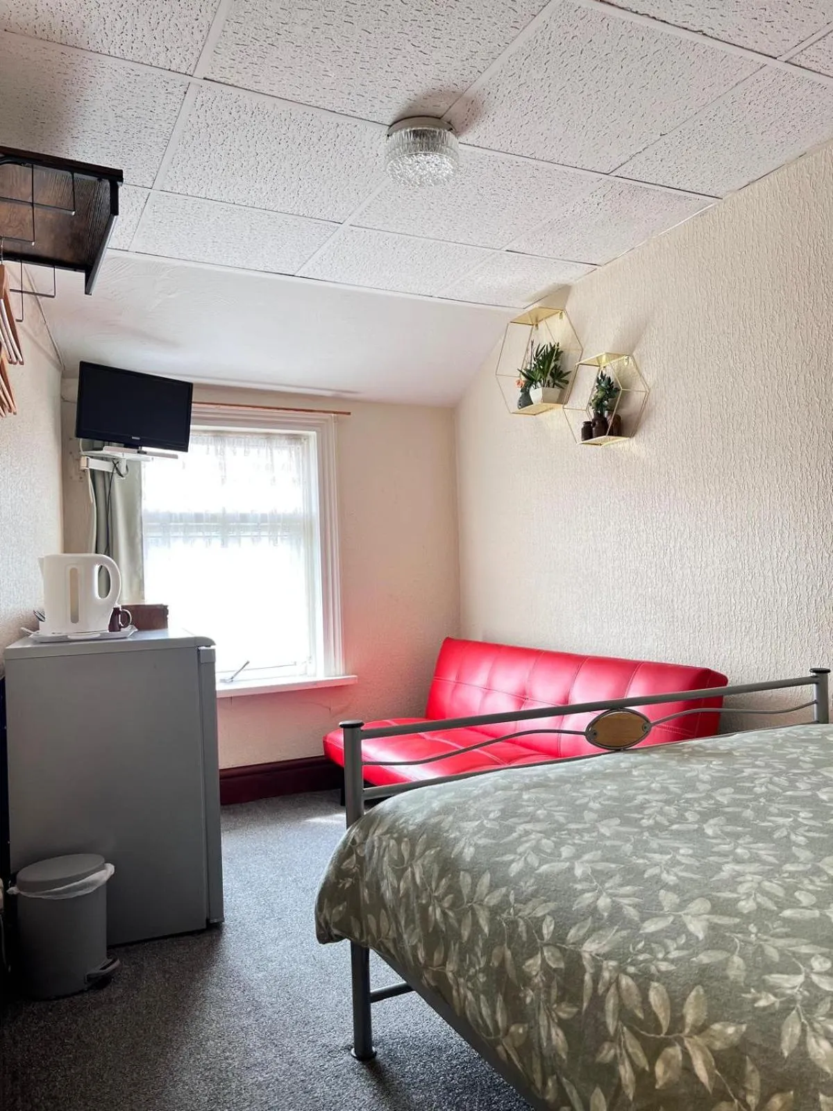 Photo of the whole room, Bed in Galaxy Hotel