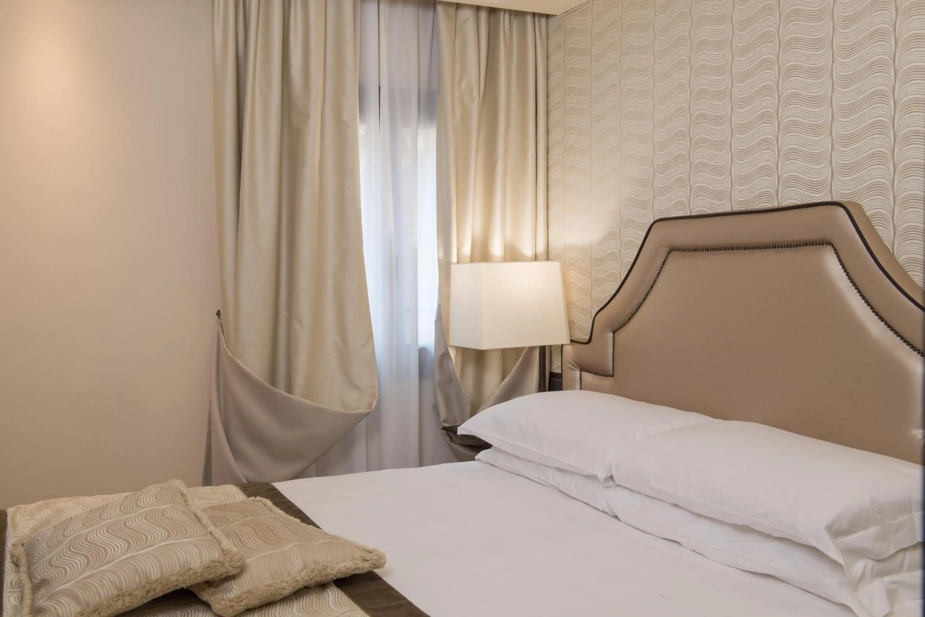 Bed in Hotel Paganelli