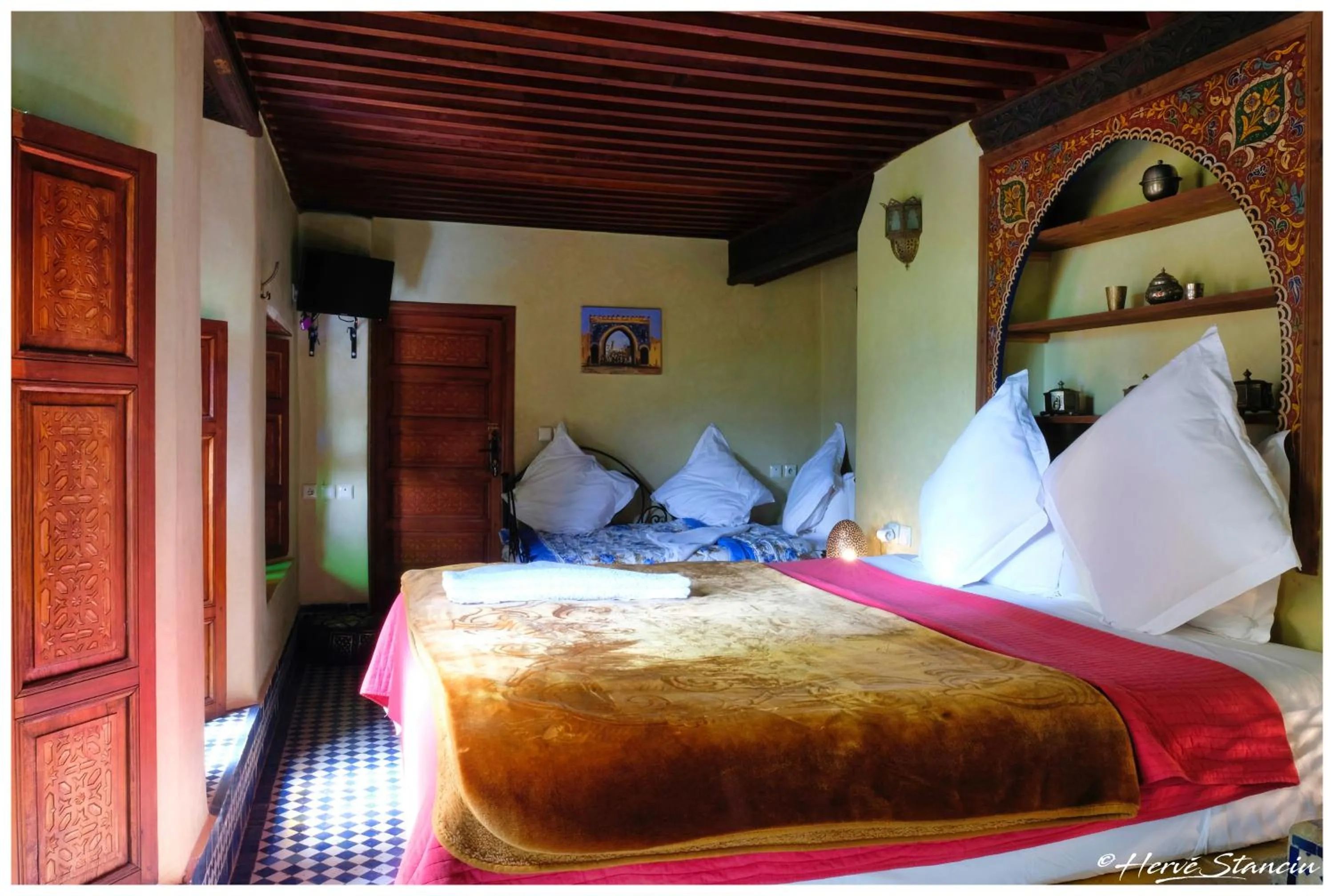 Bed in Riad Layalina Fes