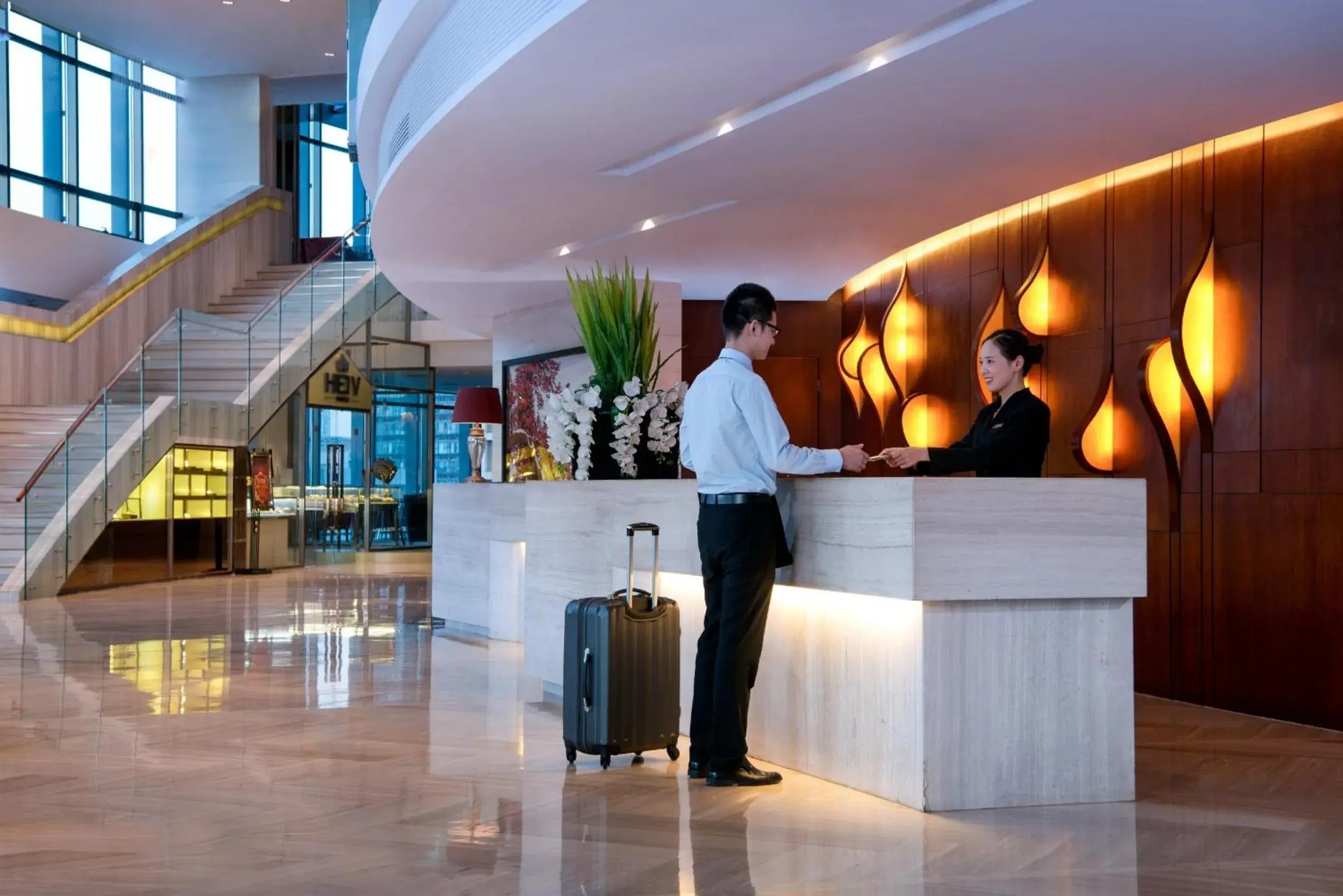 Lobby or reception in Huaqiang Plaza Hotel Shenzhen, Enjoy Complimentary Mini Bar & Night Snack, Add breakfast - enjoy complimentary afternoon tea Lobby or reception in Huaqiang Plaza Hotel Shenzhen, Enjoy Complimentary Mini Bar & Night Snack, Add breakfast - enjoy complimentary afternoon tea