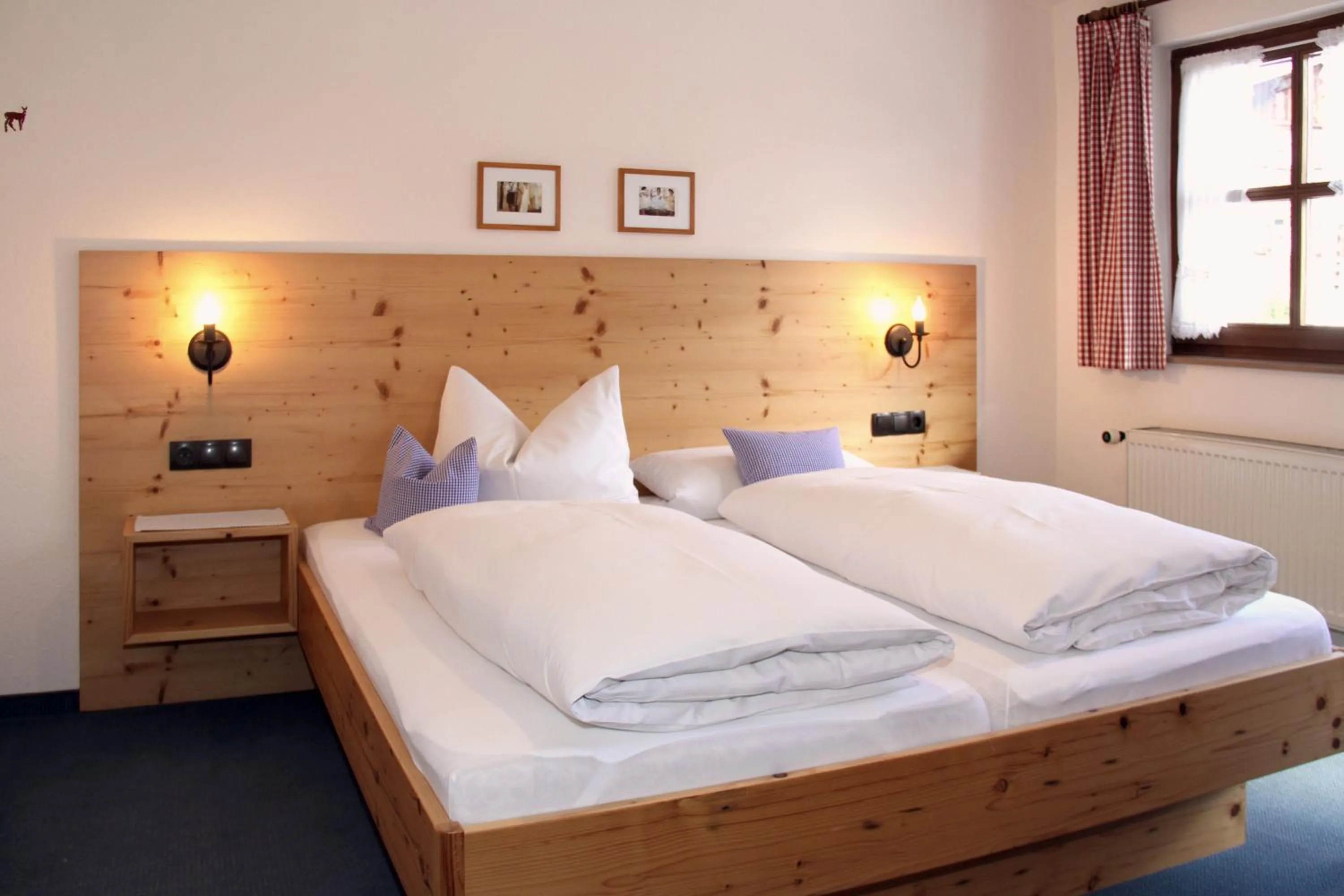 Bed in Ferienwohnungen Vogler