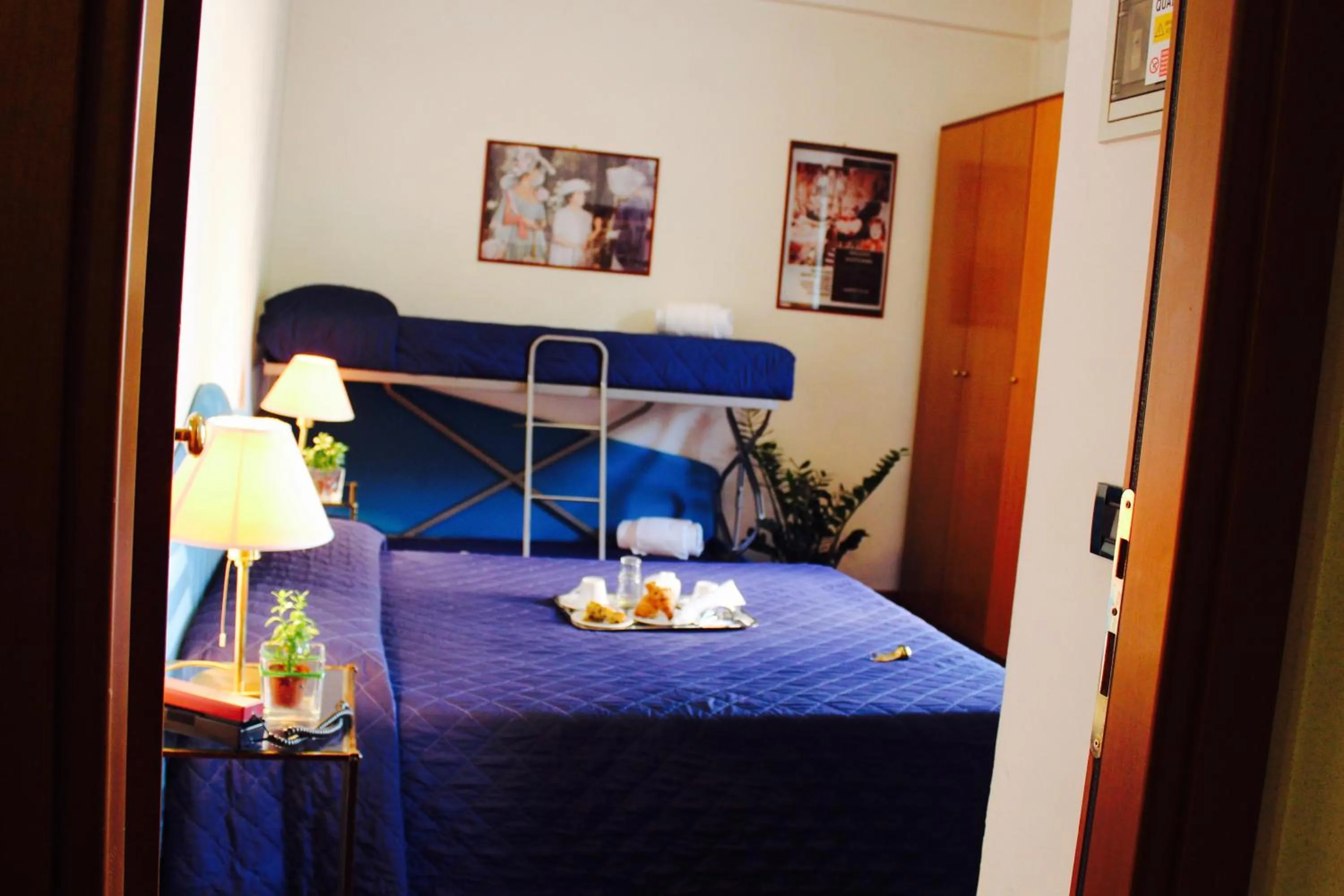 Bed in Arcangelo Roof Hotel