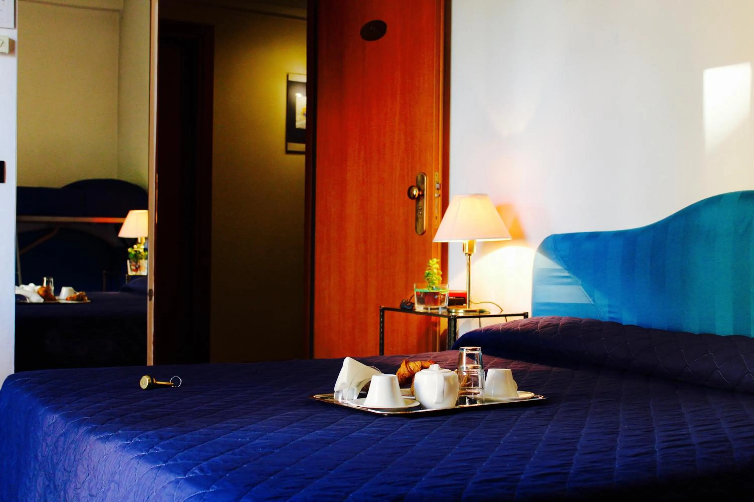 Bed in Arcangelo Roof Hotel