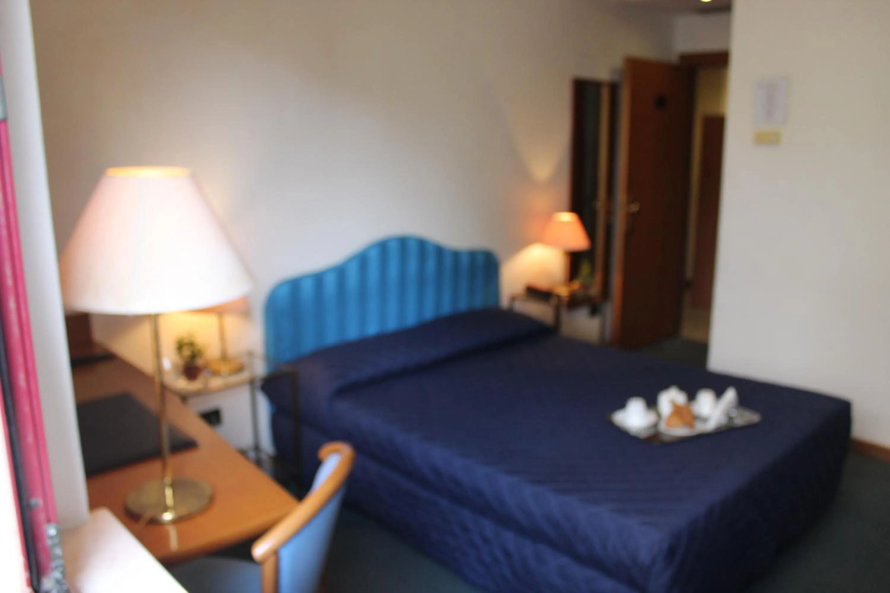 Bed in Arcangelo Roof Hotel