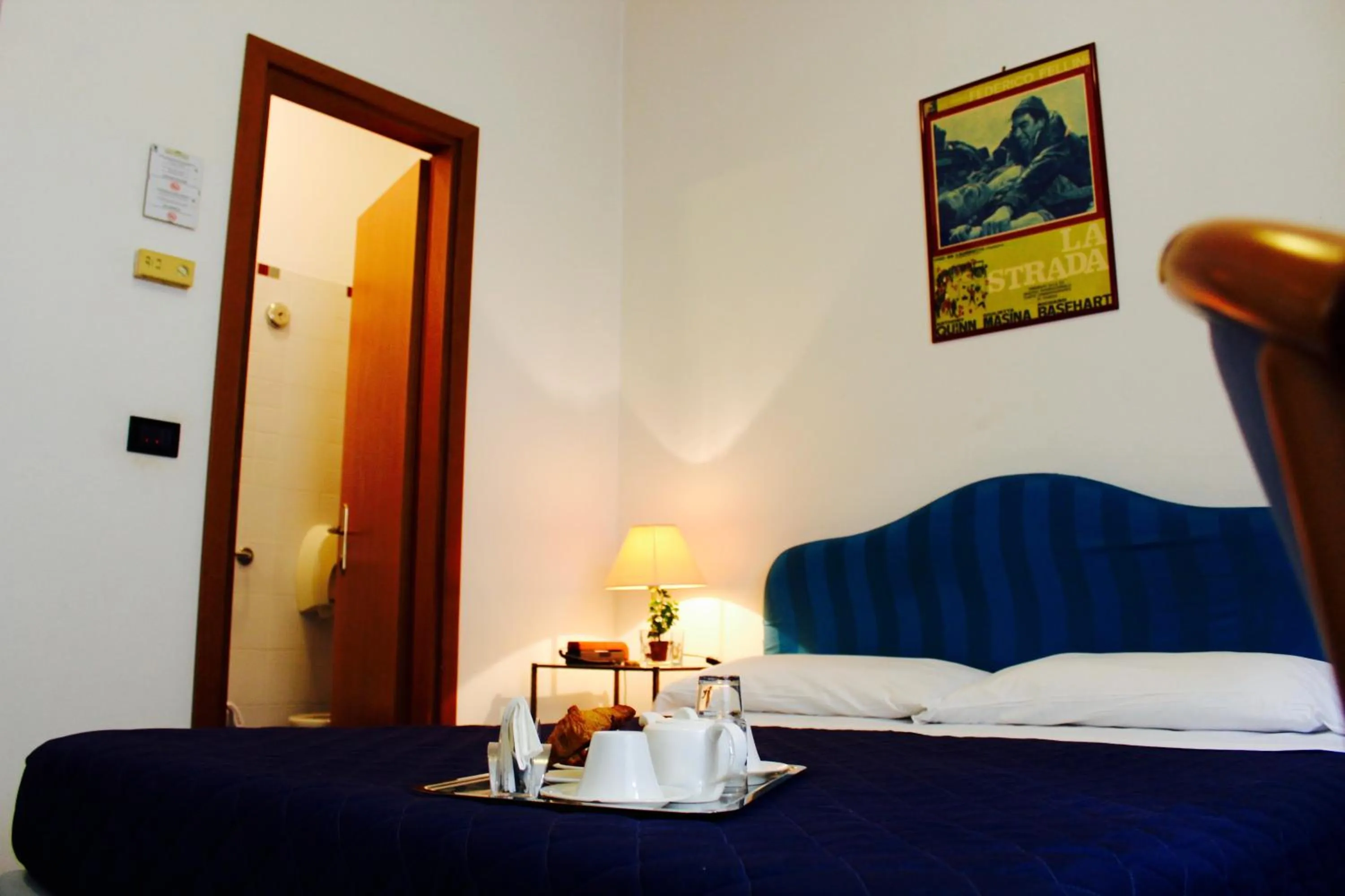 Bed in Arcangelo Roof Hotel