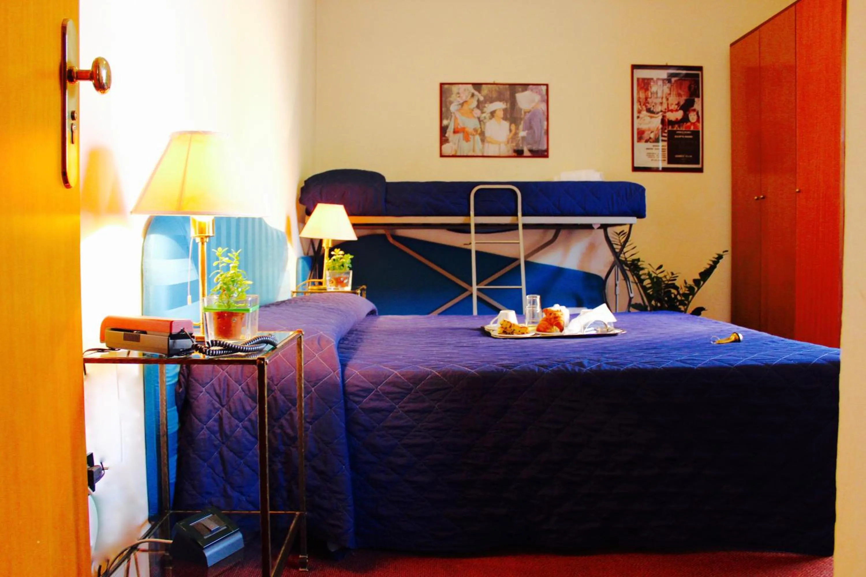 Bed in Arcangelo Roof Hotel