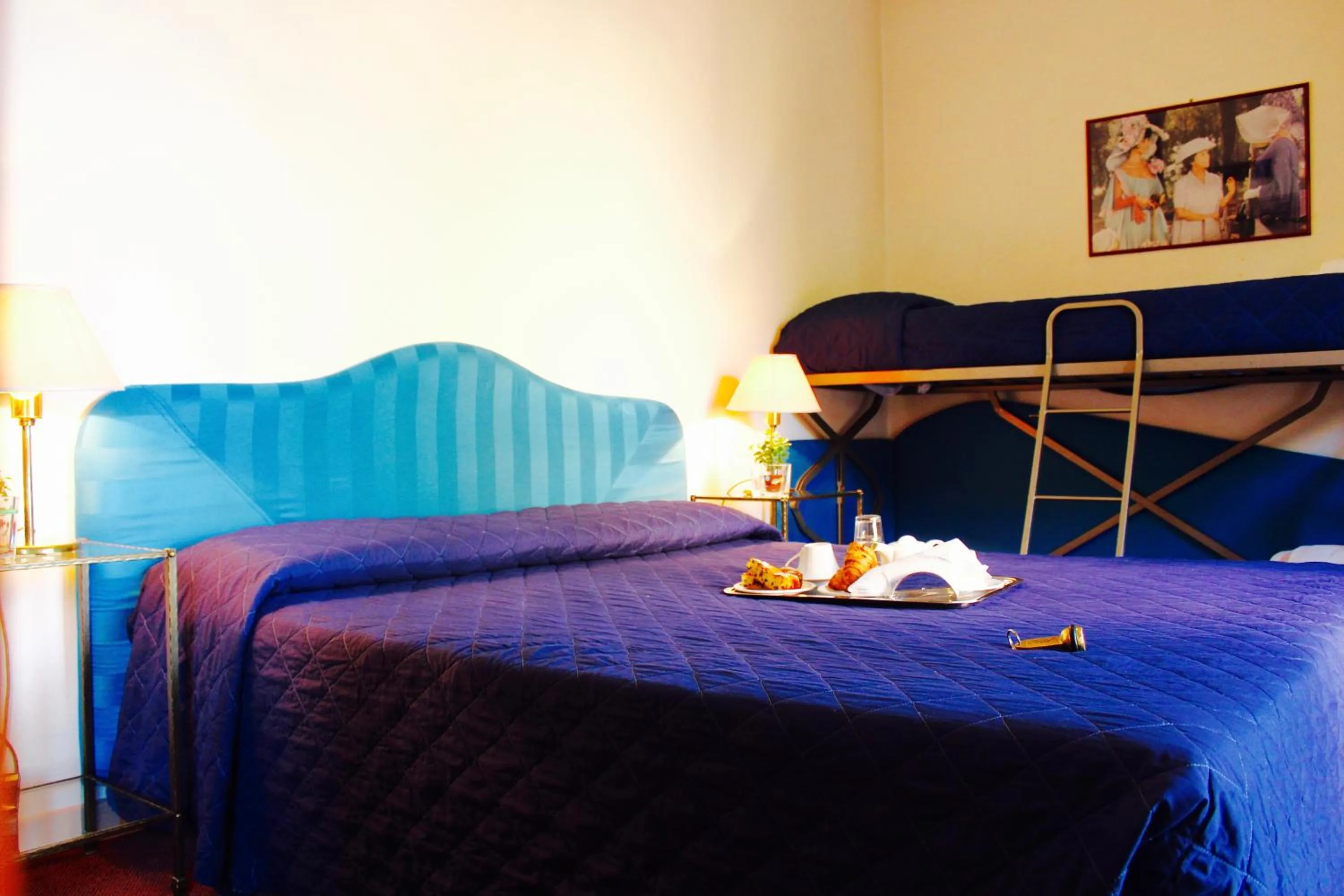 Bed in Arcangelo Roof Hotel