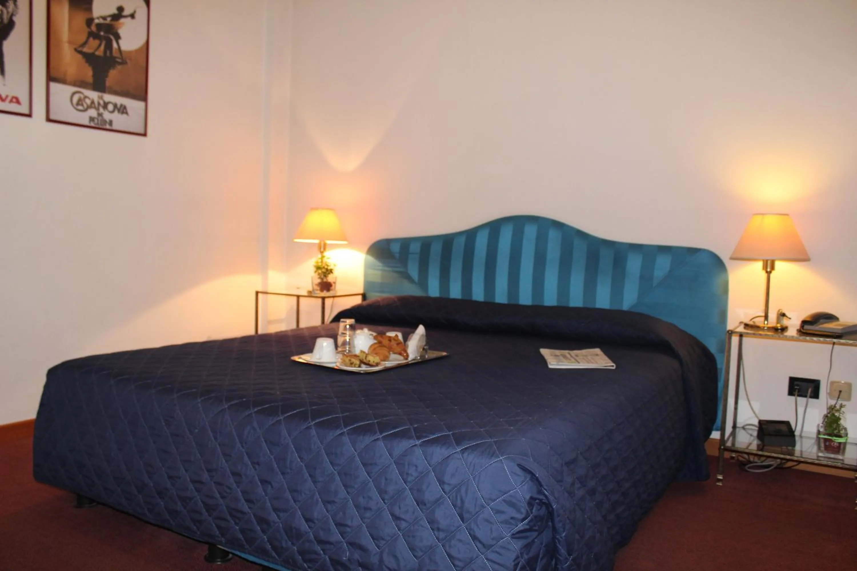 Bed in Arcangelo Roof Hotel