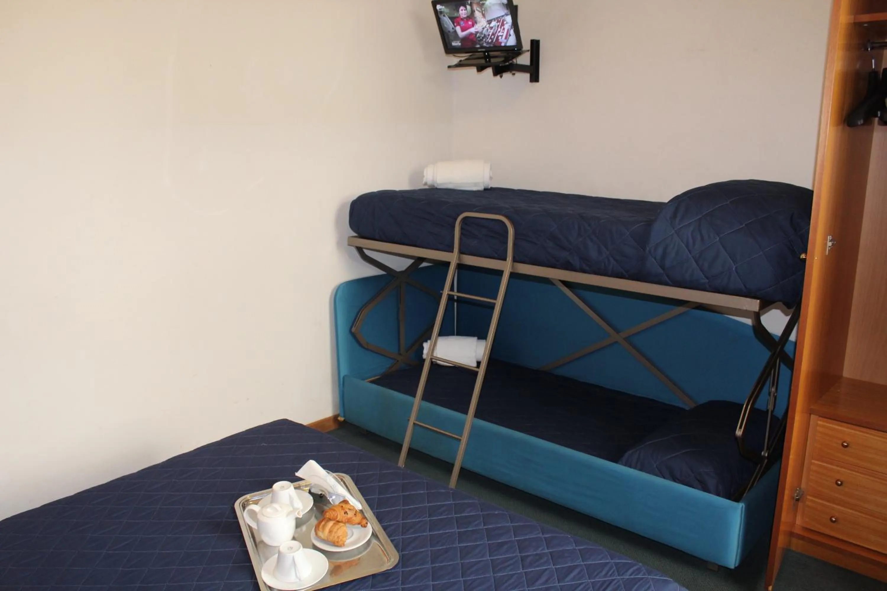 Bed in Arcangelo Roof Hotel