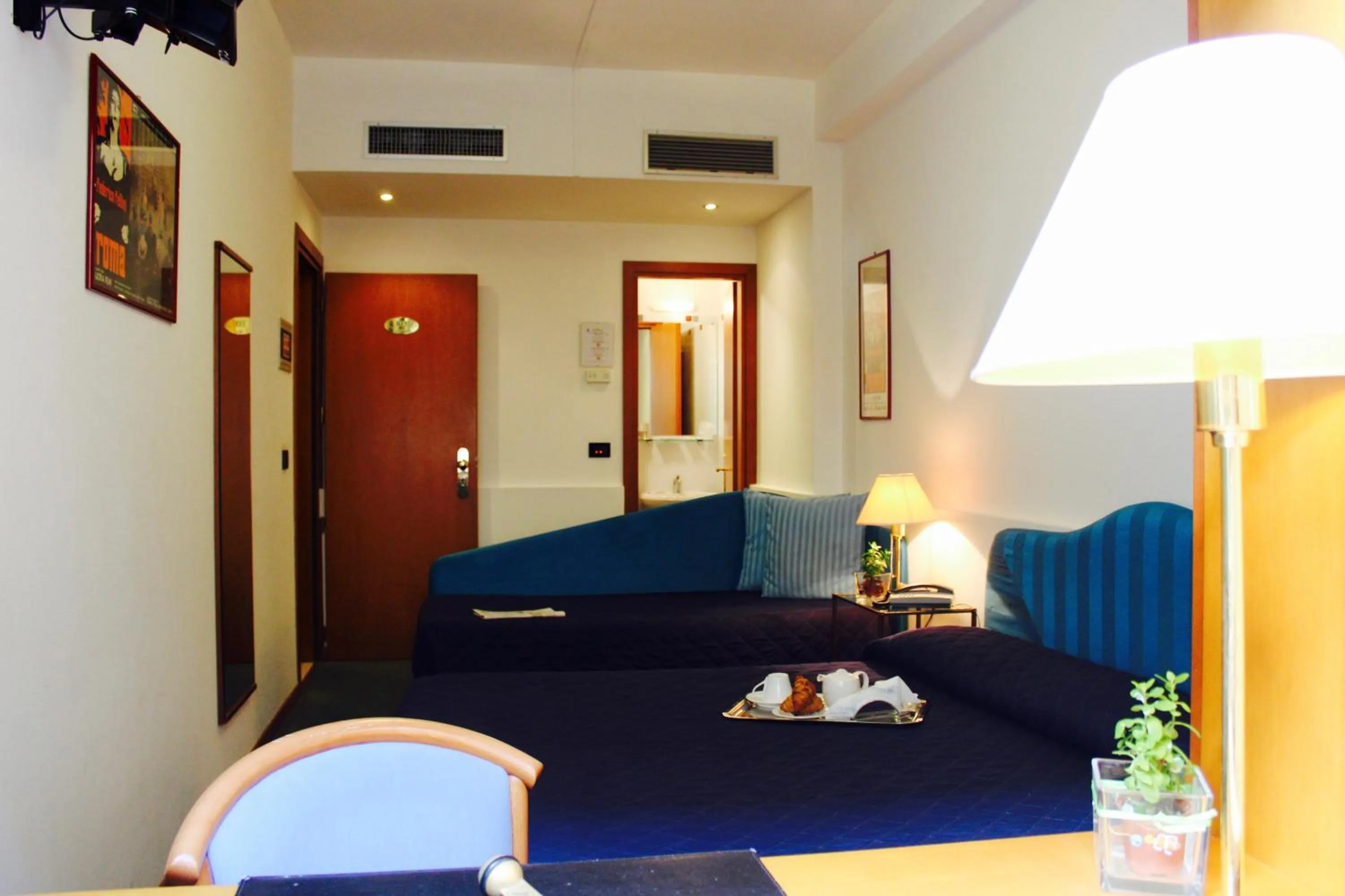 Bed in Arcangelo Roof Hotel