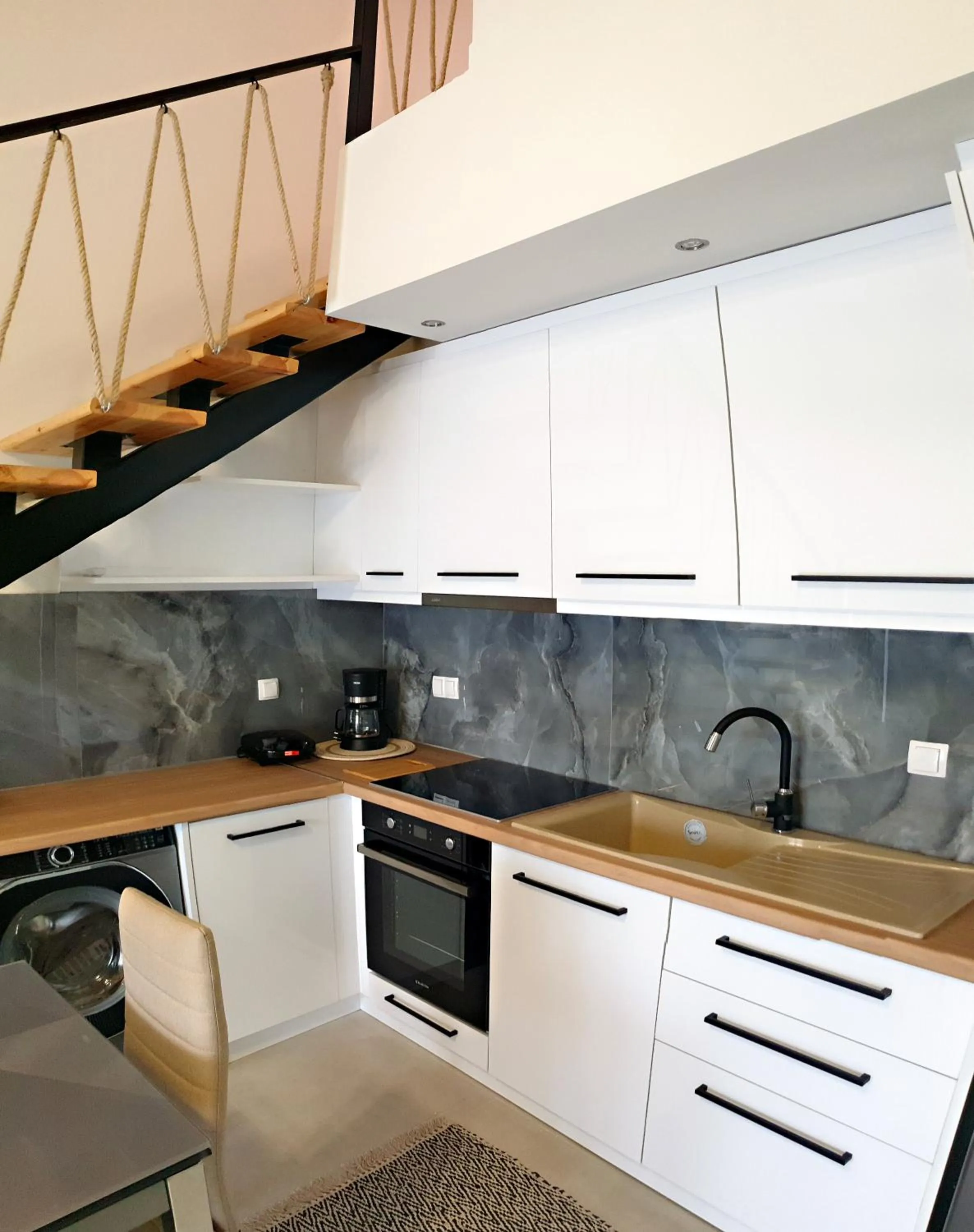 kitchen in Almeta Suites