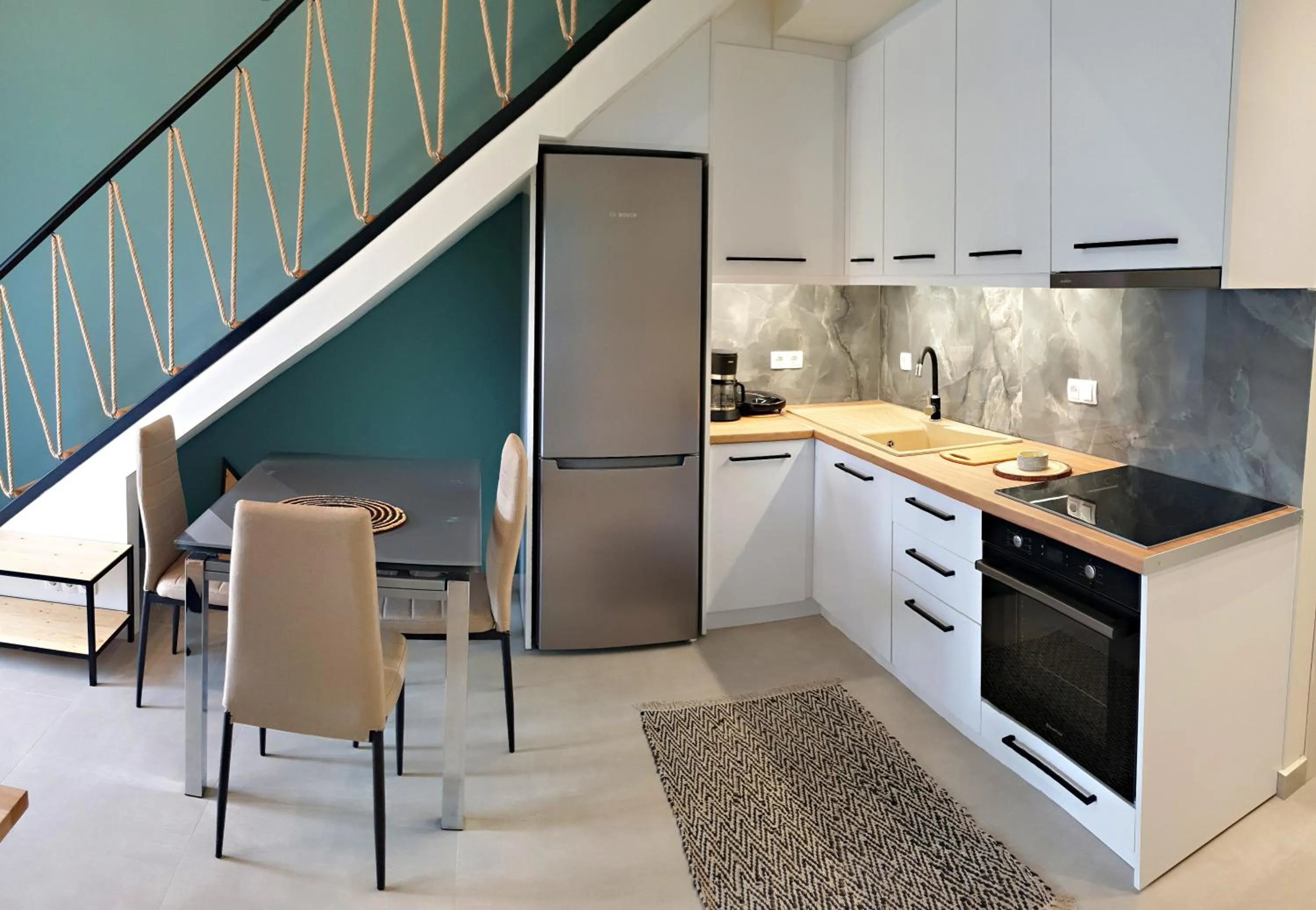 Kitchen or kitchenette in Almeta Suites