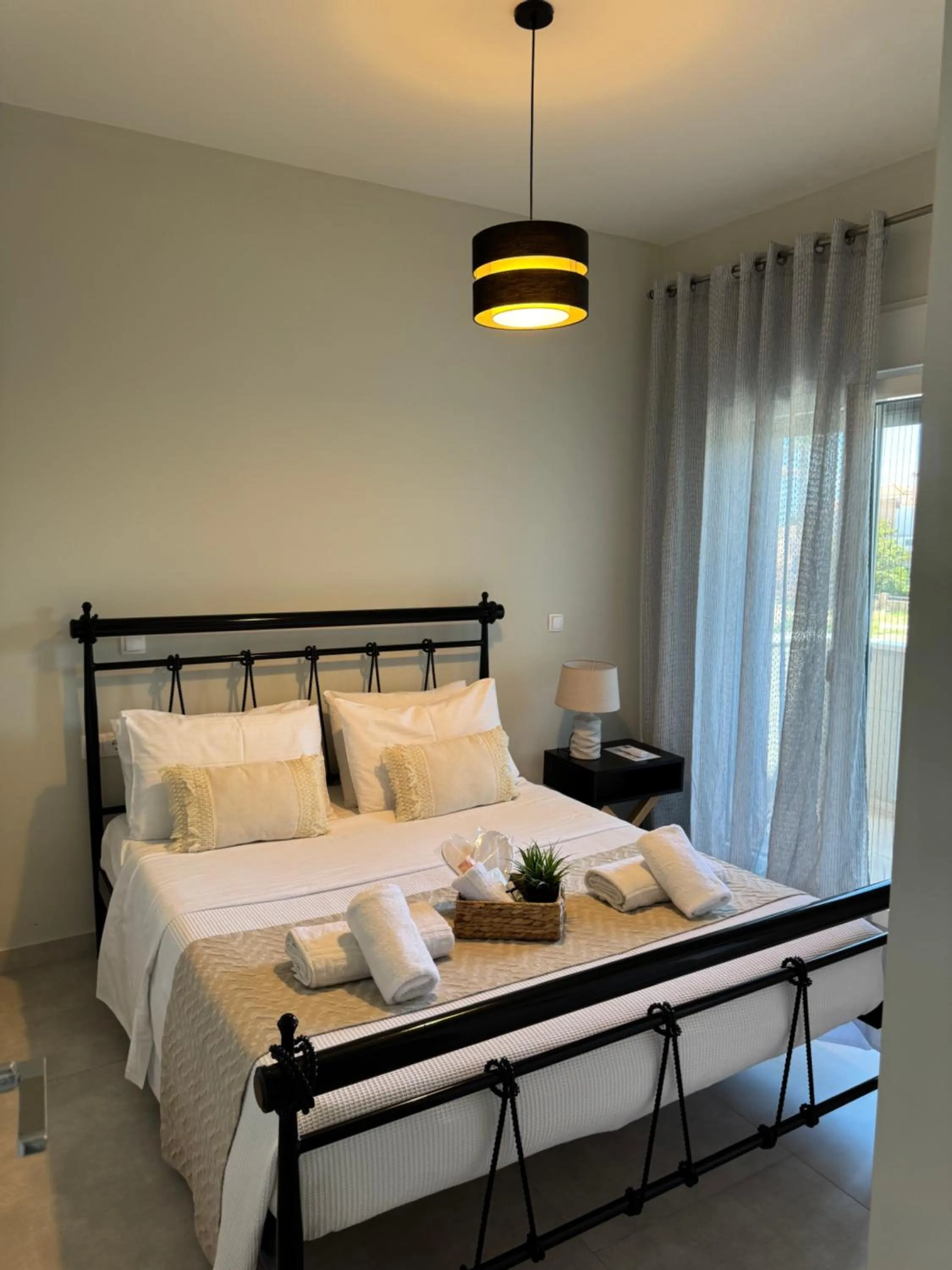 Bed in Almeta Suites