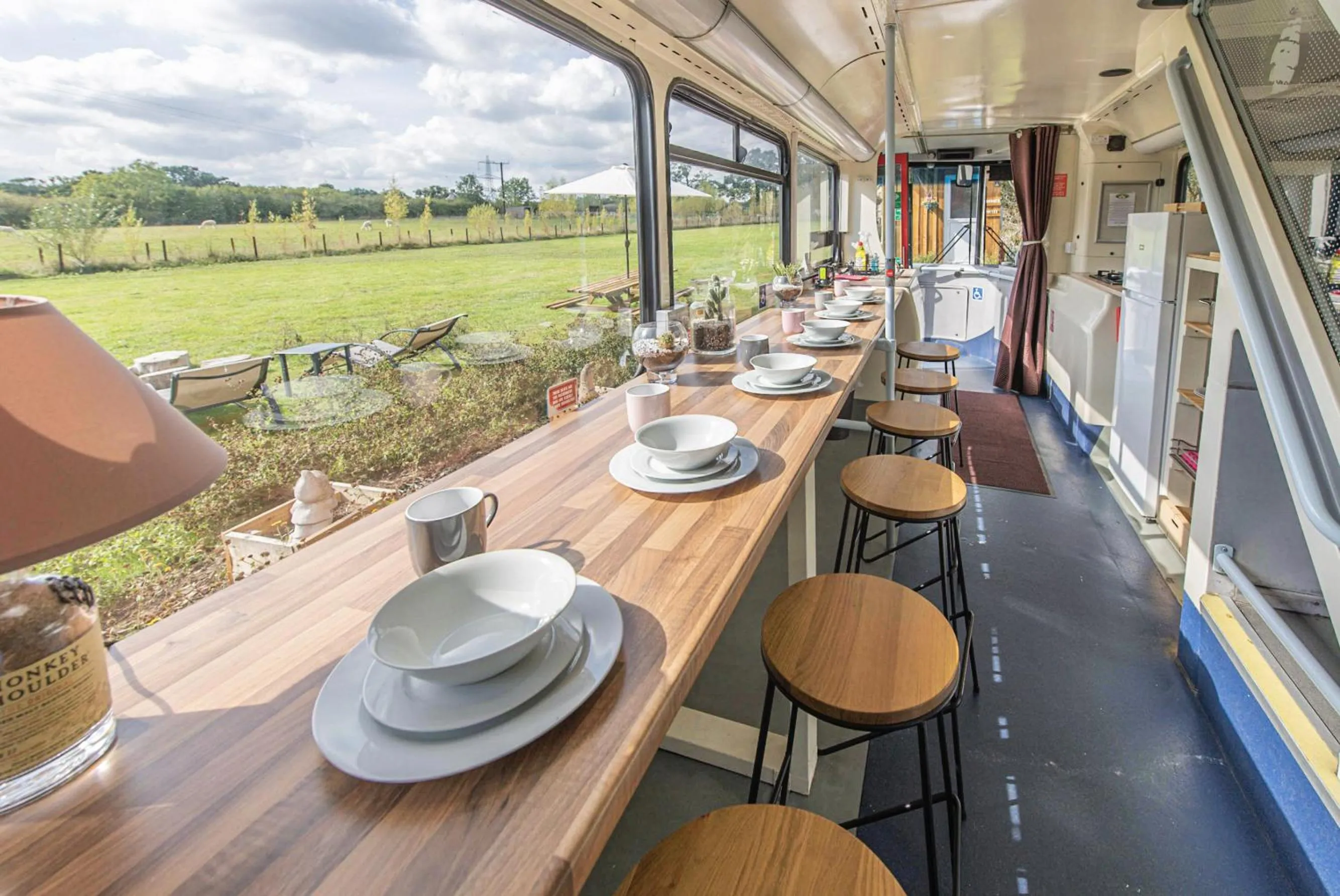 Dining area in Double Decker Bus on an Alpaca Farm sleeps 8