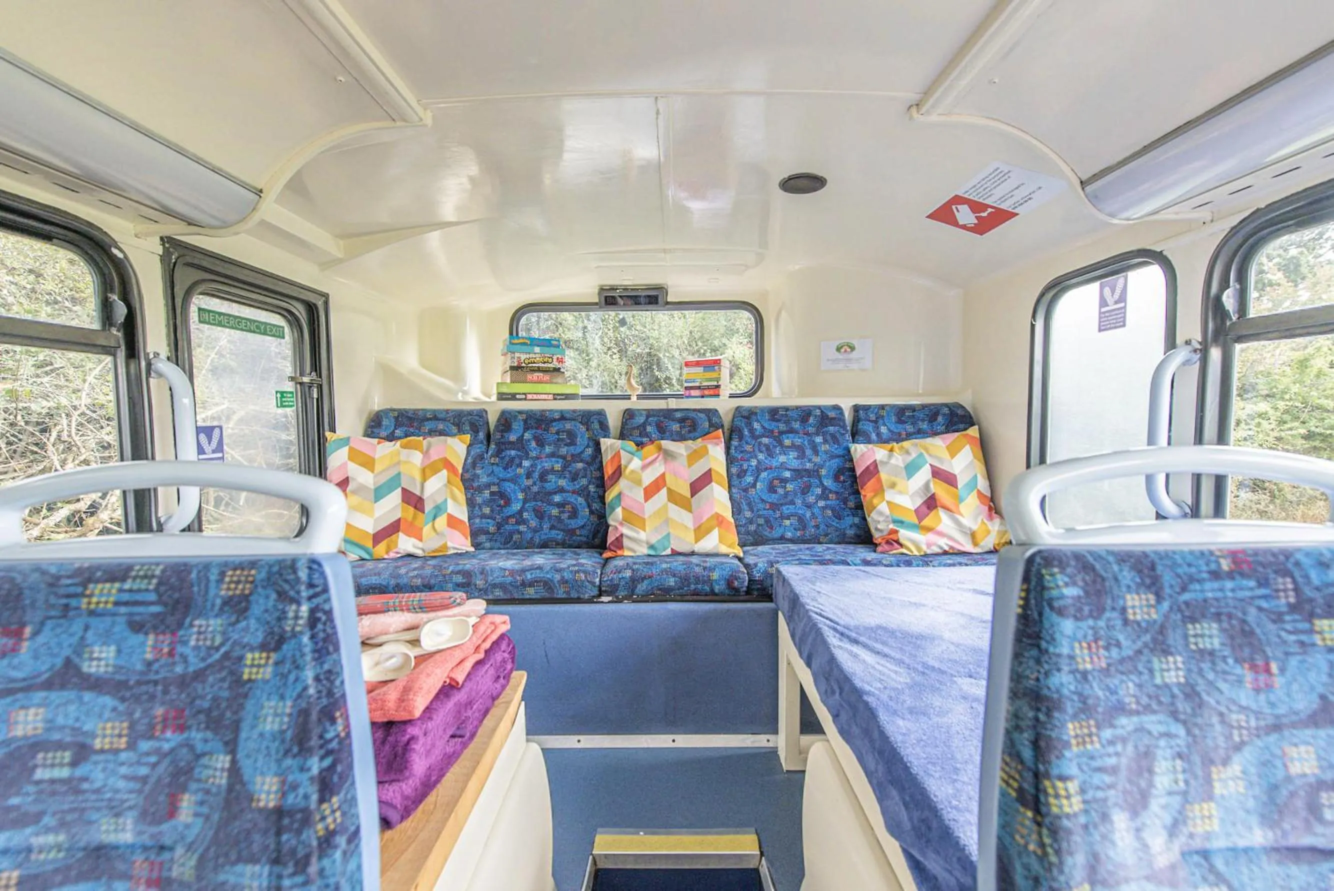 Living room in Double Decker Bus on an Alpaca Farm sleeps 8