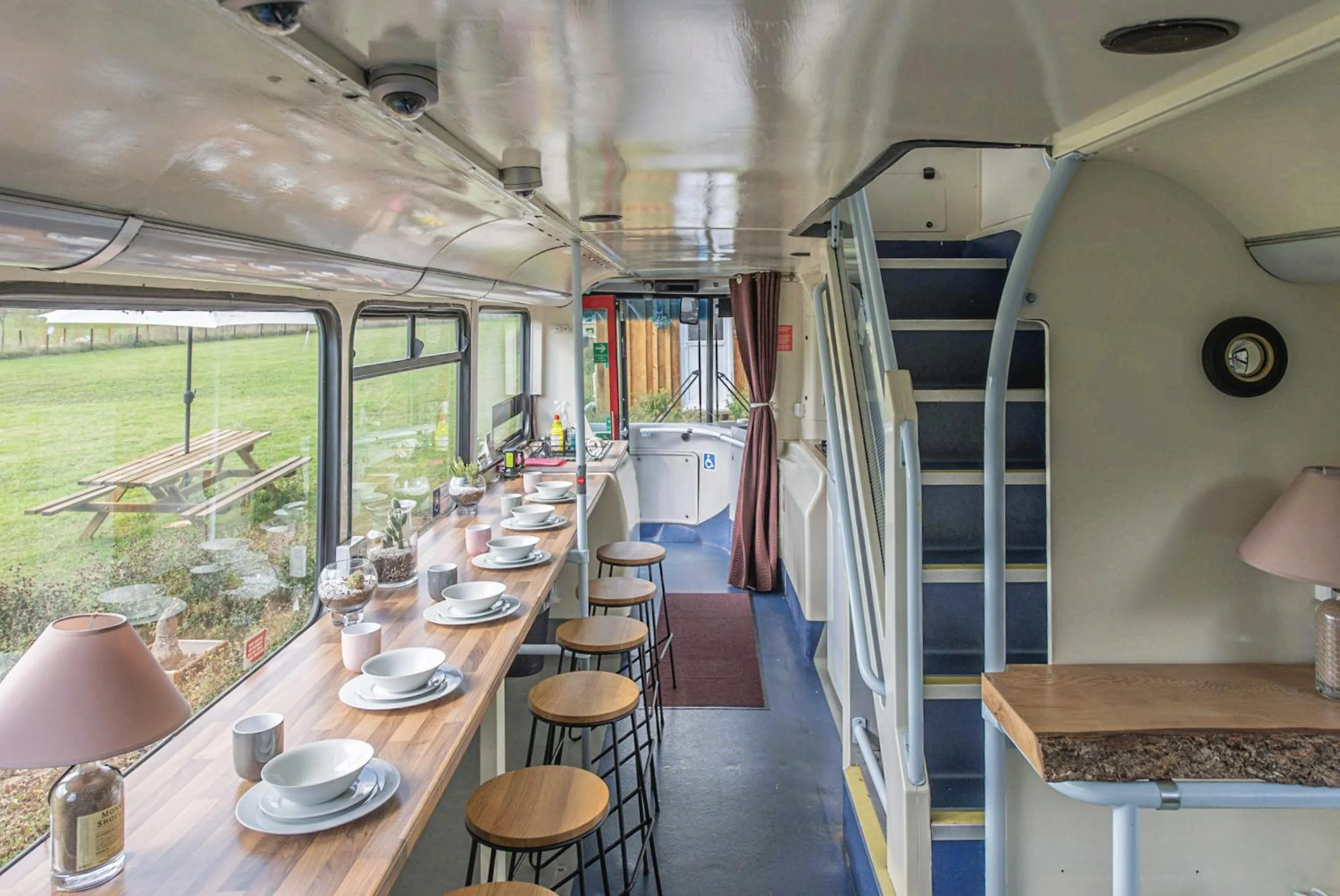 Dining area in Double Decker Bus on an Alpaca Farm sleeps 8