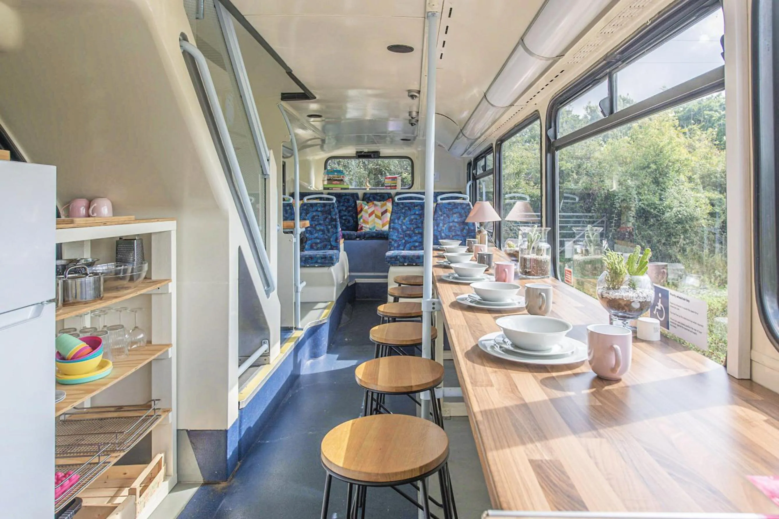 Dining area in Double Decker Bus on an Alpaca Farm sleeps 8